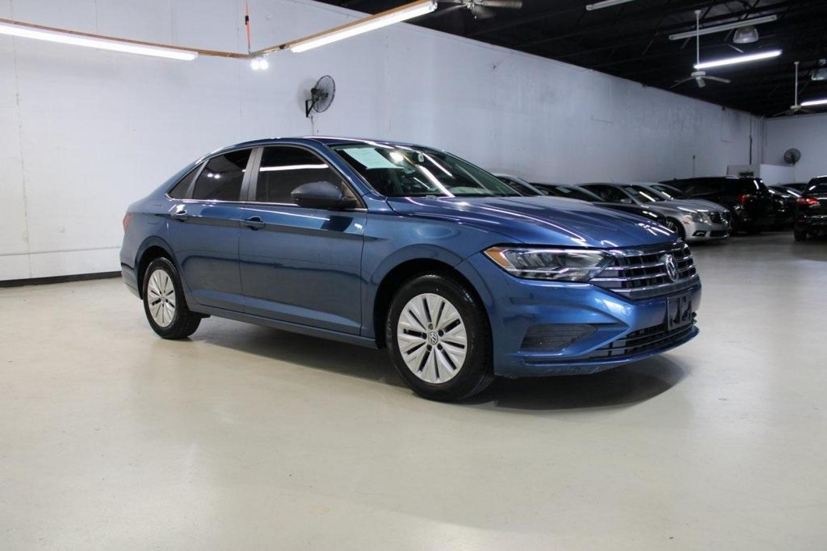 2020 Silk /Black Volkswagen Jetta 1.4T S (3VWCB7BU6LM) with an 1.4L TSI engine, Automatic transmission, located at 15300 Midway Rd., Addison, TX, 75001, (972) 702-0011, 32.958321, -96.838074 - HOME OF THE NO HAGGLE PRICE - WHOLESALE PRICES TO THE PUBLIC!! Priced below KBB Fair Purchase Price!<br><br>Blue Silk Metallic 2020 Volkswagen Jetta 1.4T S<br><br>30/40 City/Highway MPG<br><br>Awards:<br> * 2020 KBB.com 10 Coolest New Cars Under $20,000<br><br>At Midway Auto Group, we strive to pro - Photo#6