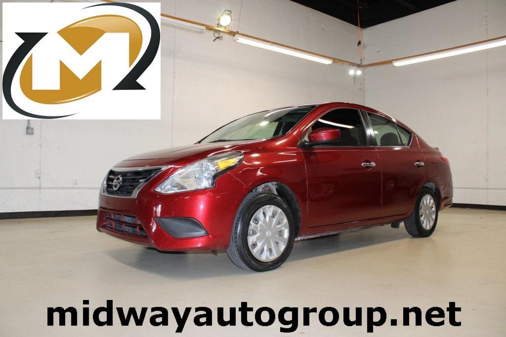 2019 Cayenne Red Metallic /Charcoal Nissan Versa 1.6 SV (3N1CN7AP8KL) with an 1.6L 4-Cylinder DOHC 16V engine, CVT transmission, located at 15300 Midway Rd., Addison, TX, 75001, (972) 702-0011, 32.958321, -96.838074 - Photo#0