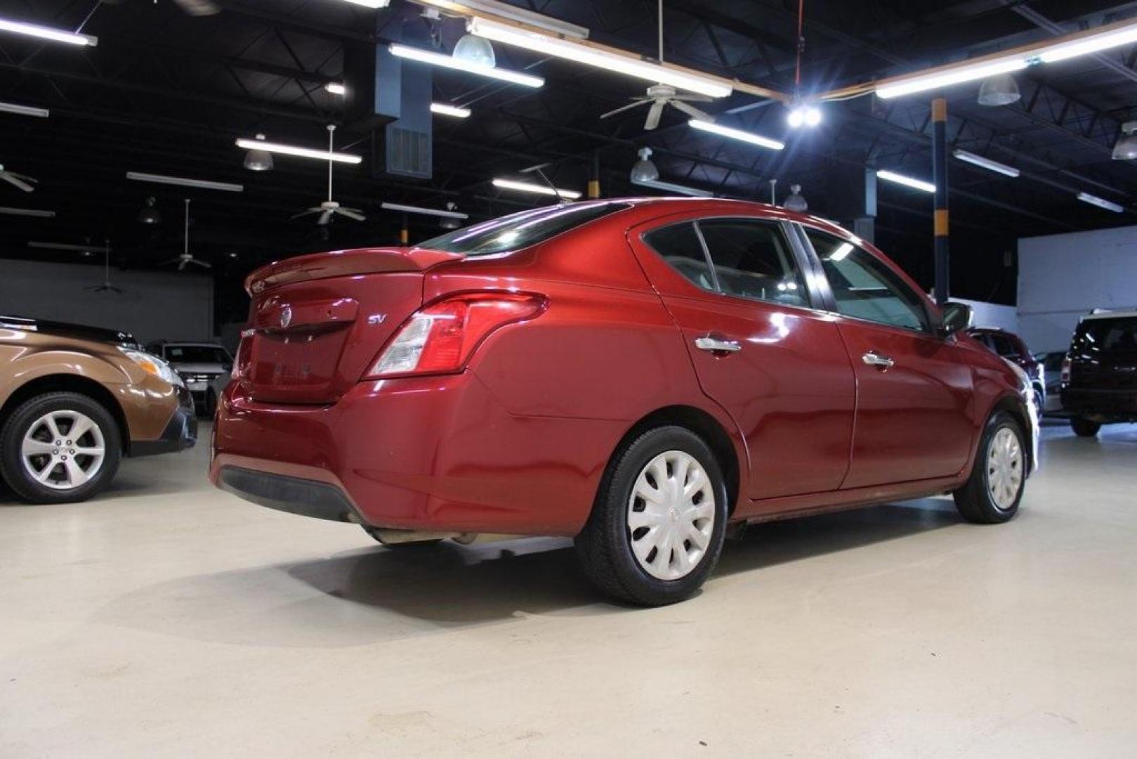 2019 Cayenne Red Metallic /Charcoal Nissan Versa 1.6 SV (3N1CN7AP8KL) with an 1.6L 4-Cylinder DOHC 16V engine, CVT transmission, located at 15300 Midway Rd., Addison, TX, 75001, (972) 702-0011, 32.958321, -96.838074 - Photo#1