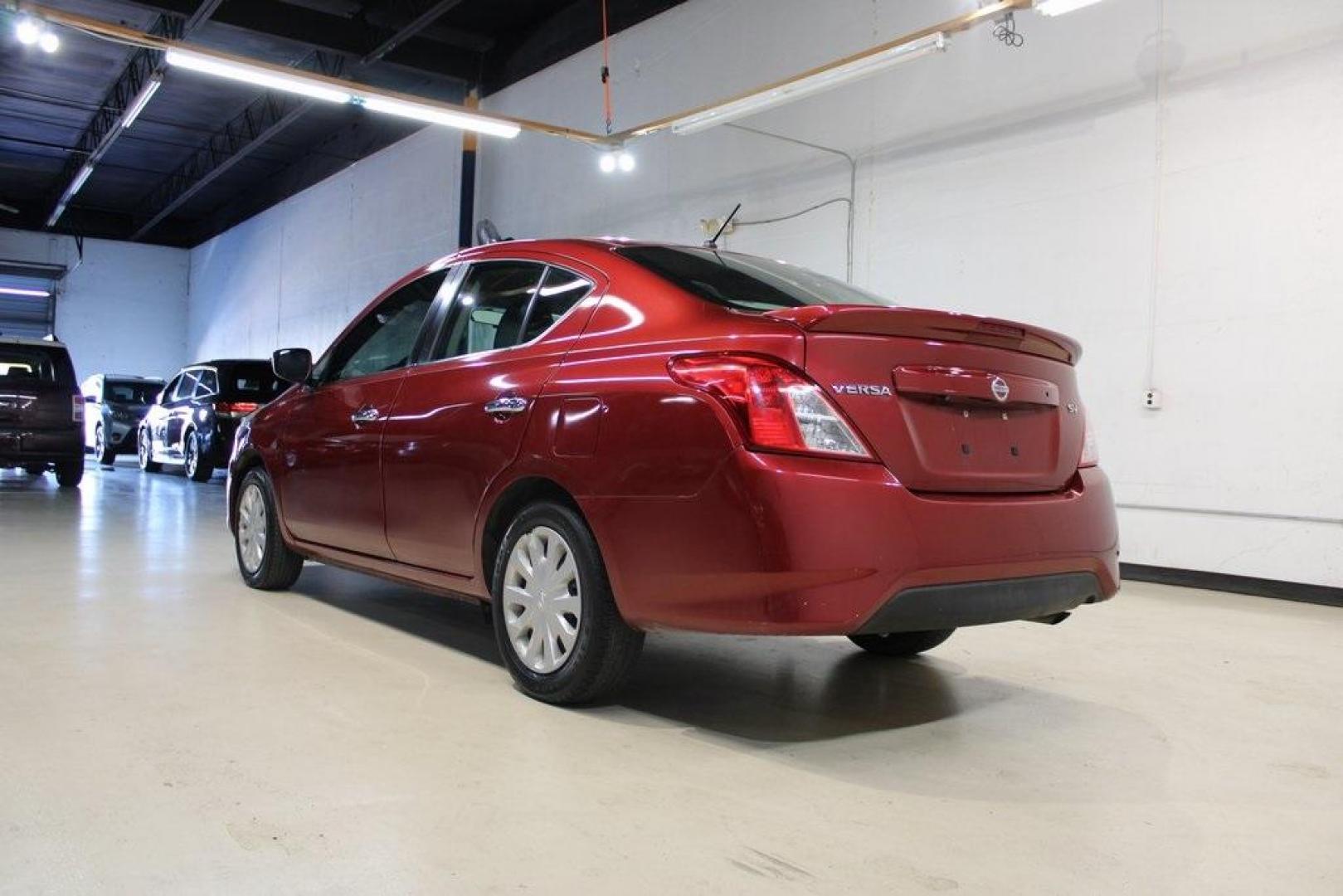 2019 Cayenne Red Metallic /Charcoal Nissan Versa 1.6 SV (3N1CN7AP8KL) with an 1.6L 4-Cylinder DOHC 16V engine, CVT transmission, located at 15300 Midway Rd., Addison, TX, 75001, (972) 702-0011, 32.958321, -96.838074 - Photo#2