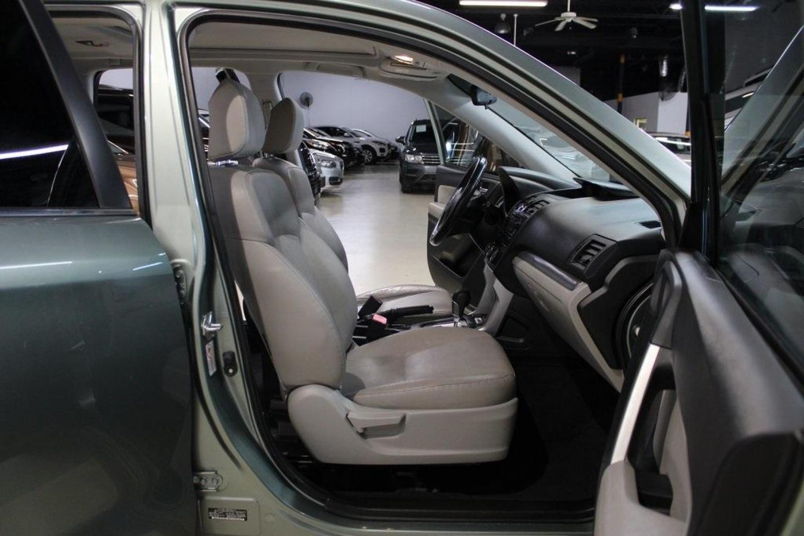2014 Jasmine Green Metallic /Gray Subaru Forester 2.5i Limited (JF2SJAHC4EH) with an 2.5L 4-Cylinder DOHC 16V VVT engine, CVT transmission, located at 15300 Midway Rd., Addison, TX, 75001, (972) 702-0011, 32.958321, -96.838074 - HOME OF THE NO HAGGLE PRICE - WHOLESALE PRICES TO THE PUBLIC!! Forester 2.5i Limited, 4D Sport Utility, 2.5L 4-Cylinder DOHC 16V VVT, Lineartronic CVT, AWD, Jasmine Green Metallic, Gray Leather.<br><br>Jasmine Green Metallic 2014 Subaru Forester 2.5i Limited<br><br>24/32 City/Highway MPG<br><br>Awar - Photo#13
