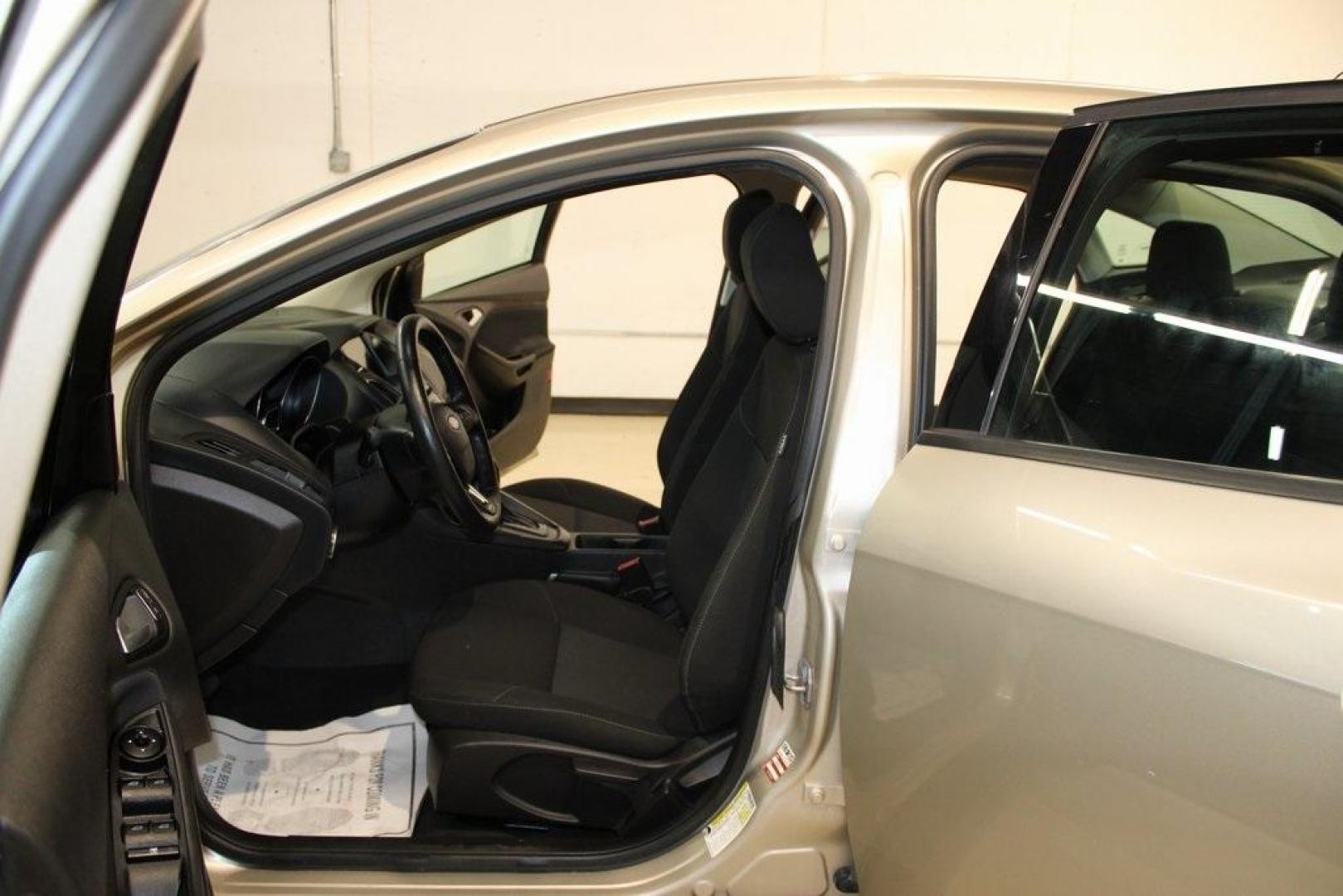 2017 White Gold /Charcoal Black Ford Focus SEL (1FADP3H24HL) with an I4 engine, Automatic transmission, located at 15300 Midway Rd., Addison, TX, 75001, (972) 702-0011, 32.958321, -96.838074 - Photo#12