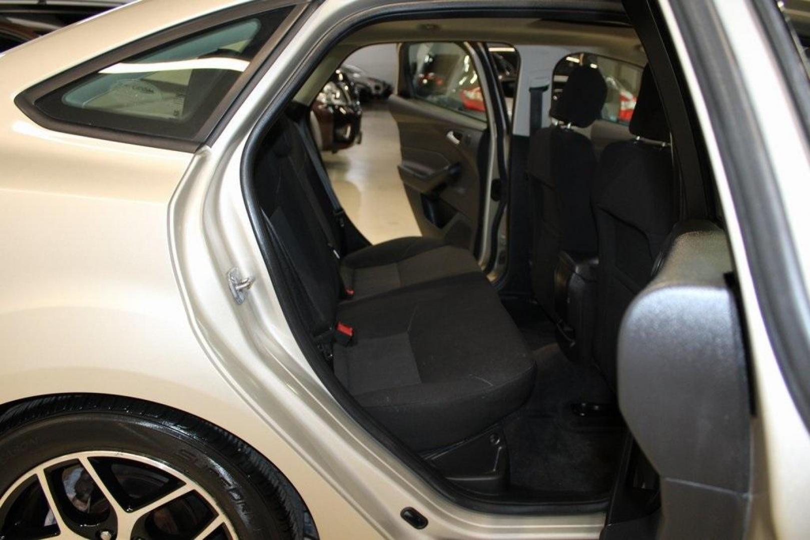 2017 White Gold /Charcoal Black Ford Focus SEL (1FADP3H24HL) with an I4 engine, Automatic transmission, located at 15300 Midway Rd., Addison, TX, 75001, (972) 702-0011, 32.958321, -96.838074 - Photo#14