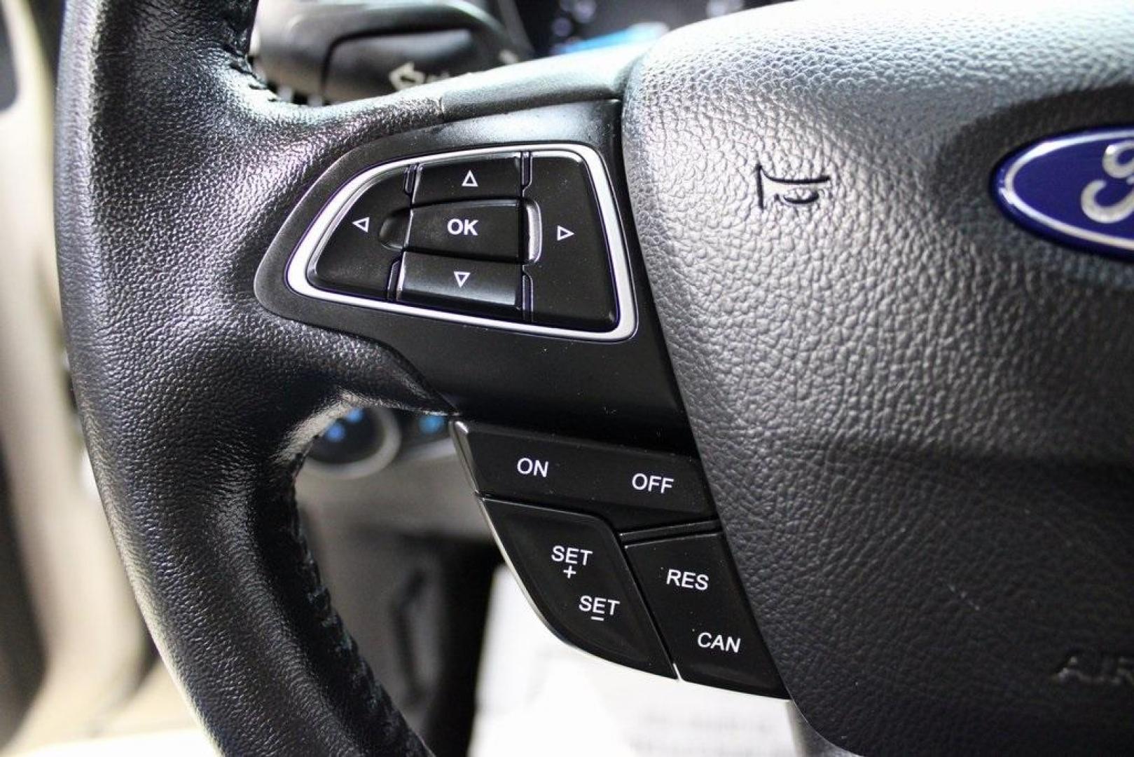 2017 White Gold /Charcoal Black Ford Focus SEL (1FADP3H24HL) with an I4 engine, Automatic transmission, located at 15300 Midway Rd., Addison, TX, 75001, (972) 702-0011, 32.958321, -96.838074 - Photo#23