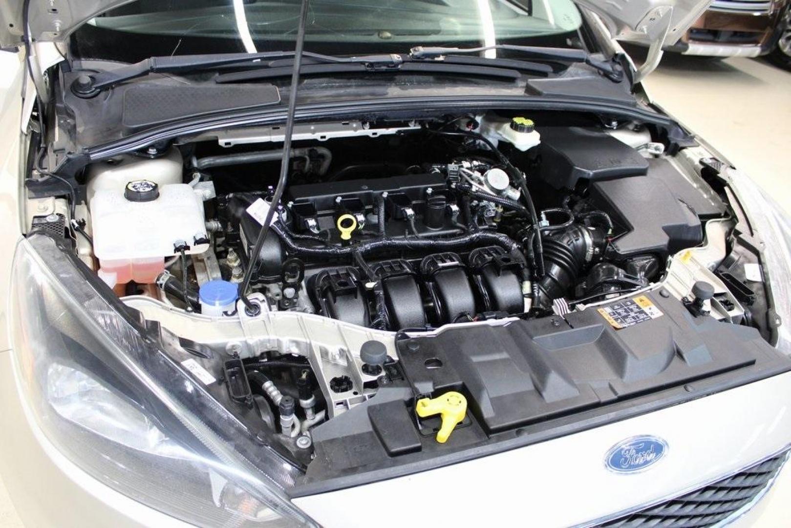 2017 White Gold /Charcoal Black Ford Focus SEL (1FADP3H24HL) with an I4 engine, Automatic transmission, located at 15300 Midway Rd., Addison, TX, 75001, (972) 702-0011, 32.958321, -96.838074 - Photo#27