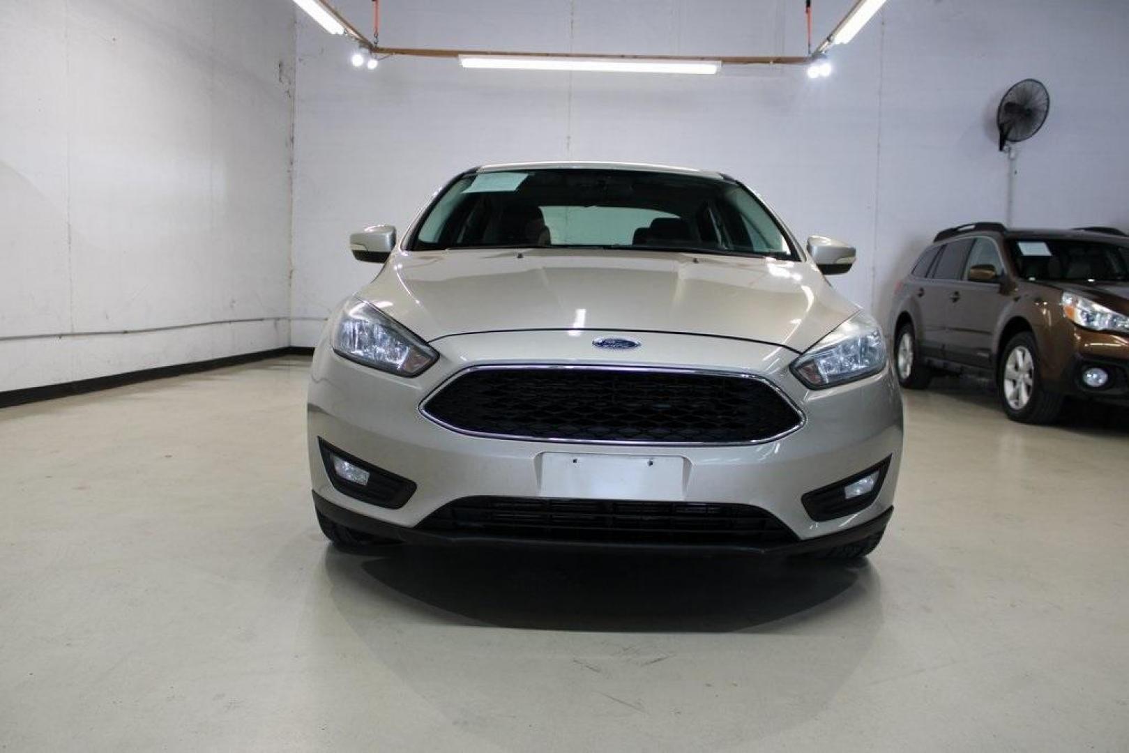 2017 White Gold /Charcoal Black Ford Focus SEL (1FADP3H24HL) with an I4 engine, Automatic transmission, located at 15300 Midway Rd., Addison, TX, 75001, (972) 702-0011, 32.958321, -96.838074 - Photo#5