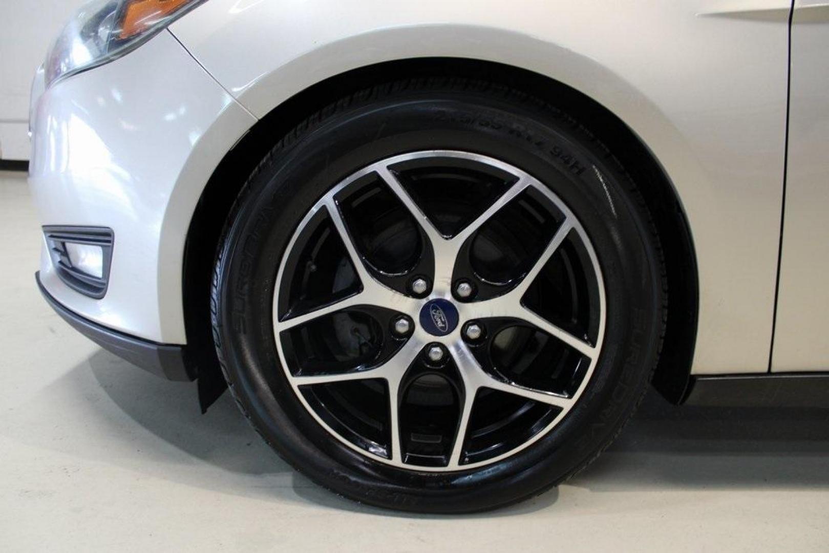 2017 White Gold /Charcoal Black Ford Focus SEL (1FADP3H24HL) with an I4 engine, Automatic transmission, located at 15300 Midway Rd., Addison, TX, 75001, (972) 702-0011, 32.958321, -96.838074 - Photo#8