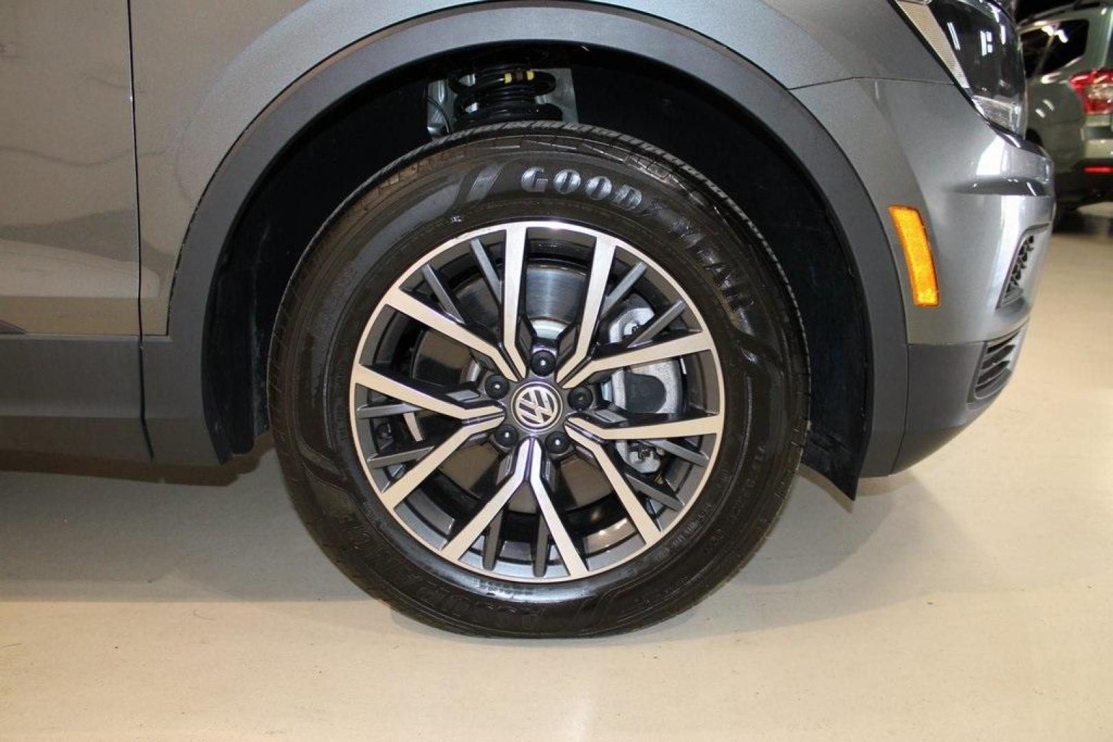 2021 Pyrite Silver Metallic /Storm Gray Volkswagen Tiguan 2.0T S (3VV1B7AX0MM) with an 2.0L TSI DOHC engine, Automatic transmission, located at 15300 Midway Rd., Addison, TX, 75001, (972) 702-0011, 32.958321, -96.838074 - HOME OF THE NO HAGGLE PRICE - WHOLESALE PRICES TO THE PUBLIC!! Tiguan 2.0T S, 4D Sport Utility, 2.0L TSI DOHC, 8-Speed Automatic with Tiptronic, FWD, Storm Gray Cloth.<br><br>Pyrite Silver Metallic 2021 Volkswagen Tiguan 2.0T S<br><br>23/29 City/Highway MPG<br><br><br>At Midway Auto Group, we strive - Photo#11