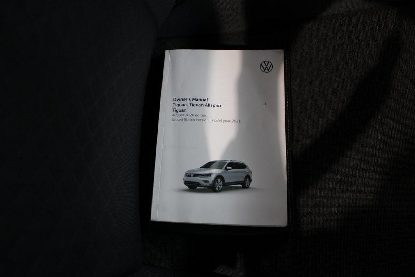 2021 Pyrite Silver Metallic /Storm Gray Volkswagen Tiguan 2.0T S (3VV1B7AX0MM) with an 2.0L TSI DOHC engine, Automatic transmission, located at 15300 Midway Rd., Addison, TX, 75001, (972) 702-0011, 32.958321, -96.838074 - HOME OF THE NO HAGGLE PRICE - WHOLESALE PRICES TO THE PUBLIC!! Tiguan 2.0T S, 4D Sport Utility, 2.0L TSI DOHC, 8-Speed Automatic with Tiptronic, FWD, Storm Gray Cloth.<br><br>Pyrite Silver Metallic 2021 Volkswagen Tiguan 2.0T S<br><br>23/29 City/Highway MPG<br><br><br>At Midway Auto Group, we strive - Photo#12