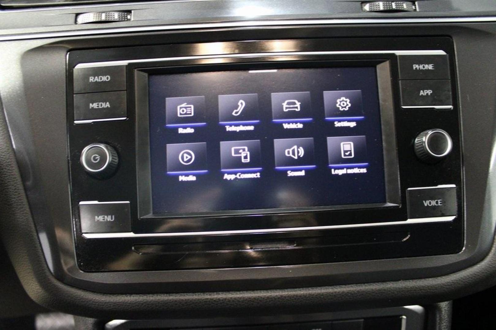 2021 Pyrite Silver Metallic /Storm Gray Volkswagen Tiguan 2.0T S (3VV1B7AX0MM) with an 2.0L TSI DOHC engine, Automatic transmission, located at 15300 Midway Rd., Addison, TX, 75001, (972) 702-0011, 32.958321, -96.838074 - HOME OF THE NO HAGGLE PRICE - WHOLESALE PRICES TO THE PUBLIC!! Tiguan 2.0T S, 4D Sport Utility, 2.0L TSI DOHC, 8-Speed Automatic with Tiptronic, FWD, Storm Gray Cloth.<br><br>Pyrite Silver Metallic 2021 Volkswagen Tiguan 2.0T S<br><br>23/29 City/Highway MPG<br><br><br>At Midway Auto Group, we strive - Photo#22