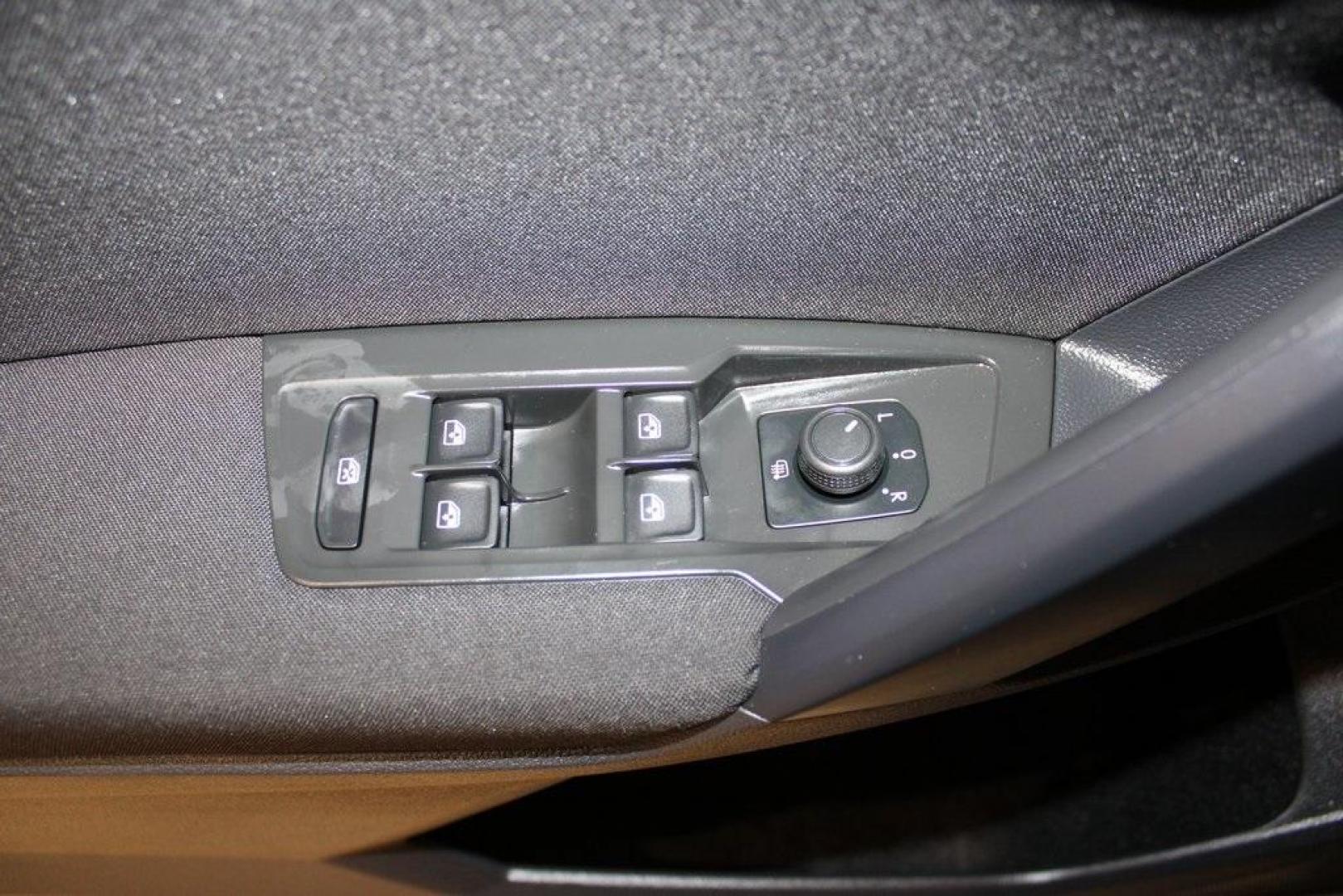 2021 Pyrite Silver Metallic /Storm Gray Volkswagen Tiguan 2.0T S (3VV1B7AX0MM) with an 2.0L TSI DOHC engine, Automatic transmission, located at 15300 Midway Rd., Addison, TX, 75001, (972) 702-0011, 32.958321, -96.838074 - HOME OF THE NO HAGGLE PRICE - WHOLESALE PRICES TO THE PUBLIC!! Tiguan 2.0T S, 4D Sport Utility, 2.0L TSI DOHC, 8-Speed Automatic with Tiptronic, FWD, Storm Gray Cloth.<br><br>Pyrite Silver Metallic 2021 Volkswagen Tiguan 2.0T S<br><br>23/29 City/Highway MPG<br><br><br>At Midway Auto Group, we strive - Photo#28