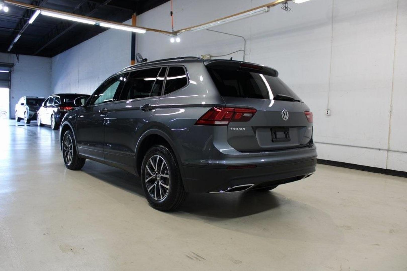 2021 Pyrite Silver Metallic /Storm Gray Volkswagen Tiguan 2.0T S (3VV1B7AX0MM) with an 2.0L TSI DOHC engine, Automatic transmission, located at 15300 Midway Rd., Addison, TX, 75001, (972) 702-0011, 32.958321, -96.838074 - HOME OF THE NO HAGGLE PRICE - WHOLESALE PRICES TO THE PUBLIC!! Tiguan 2.0T S, 4D Sport Utility, 2.0L TSI DOHC, 8-Speed Automatic with Tiptronic, FWD, Storm Gray Cloth.<br><br>Pyrite Silver Metallic 2021 Volkswagen Tiguan 2.0T S<br><br>23/29 City/Highway MPG<br><br><br>At Midway Auto Group, we strive - Photo#3