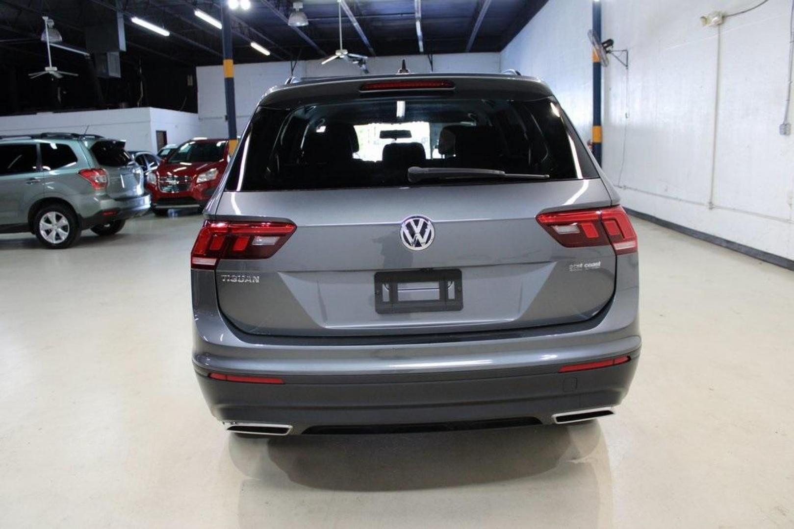 2021 Pyrite Silver Metallic /Storm Gray Volkswagen Tiguan 2.0T S (3VV1B7AX0MM) with an 2.0L TSI DOHC engine, Automatic transmission, located at 15300 Midway Rd., Addison, TX, 75001, (972) 702-0011, 32.958321, -96.838074 - HOME OF THE NO HAGGLE PRICE - WHOLESALE PRICES TO THE PUBLIC!! Tiguan 2.0T S, 4D Sport Utility, 2.0L TSI DOHC, 8-Speed Automatic with Tiptronic, FWD, Storm Gray Cloth.<br><br>Pyrite Silver Metallic 2021 Volkswagen Tiguan 2.0T S<br><br>23/29 City/Highway MPG<br><br><br>At Midway Auto Group, we strive - Photo#7