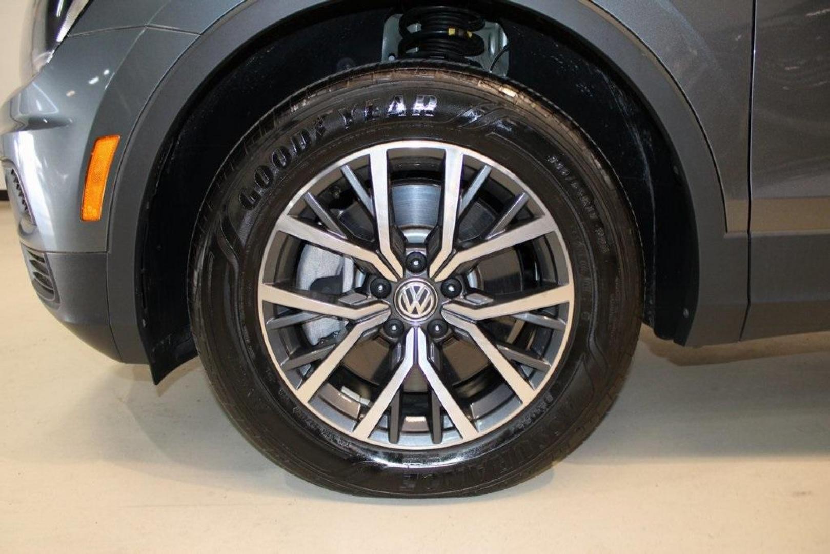 2021 Pyrite Silver Metallic /Storm Gray Volkswagen Tiguan 2.0T S (3VV1B7AX0MM) with an 2.0L TSI DOHC engine, Automatic transmission, located at 15300 Midway Rd., Addison, TX, 75001, (972) 702-0011, 32.958321, -96.838074 - HOME OF THE NO HAGGLE PRICE - WHOLESALE PRICES TO THE PUBLIC!! Tiguan 2.0T S, 4D Sport Utility, 2.0L TSI DOHC, 8-Speed Automatic with Tiptronic, FWD, Storm Gray Cloth.<br><br>Pyrite Silver Metallic 2021 Volkswagen Tiguan 2.0T S<br><br>23/29 City/Highway MPG<br><br><br>At Midway Auto Group, we strive - Photo#8