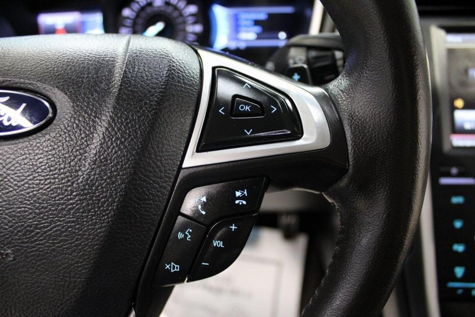 2014 Sunset Metallic /Charcoal Black Ford Fusion Titanium (3FA6P0K97ER) with an EcoBoost 2.0L I4 GTDi DOHC Turbocharged VCT engine, Automatic transmission, located at 15300 Midway Rd., Addison, TX, 75001, (972) 702-0011, 32.958321, -96.838074 - HOME OF THE NO HAGGLE PRICE - WHOLESALE PRICES TO THE PUBLIC!! Fusion Titanium, 4D Sedan, EcoBoost 2.0L I4 GTDi DOHC Turbocharged VCT, 6-Speed Automatic, FWD, Orange, Leather.<br><br>Orange 2014 Ford Fusion Titanium<br><br>22/33 City/Highway MPG<br><br>Awards:<br> * 2014 IIHS Top Safety Pick+ * 2 - Photo#24