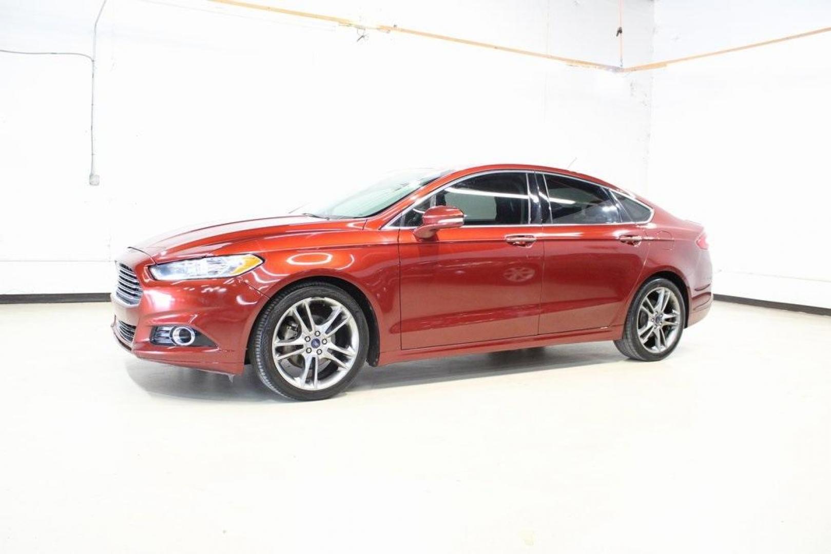 2014 Sunset Metallic /Charcoal Black Ford Fusion Titanium (3FA6P0K97ER) with an EcoBoost 2.0L I4 GTDi DOHC Turbocharged VCT engine, Automatic transmission, located at 15300 Midway Rd., Addison, TX, 75001, (972) 702-0011, 32.958321, -96.838074 - HOME OF THE NO HAGGLE PRICE - WHOLESALE PRICES TO THE PUBLIC!! Fusion Titanium, 4D Sedan, EcoBoost 2.0L I4 GTDi DOHC Turbocharged VCT, 6-Speed Automatic, FWD, Orange, Leather.<br><br>Orange 2014 Ford Fusion Titanium<br><br>22/33 City/Highway MPG<br><br>Awards:<br> * 2014 IIHS Top Safety Pick+ * 2 - Photo#3