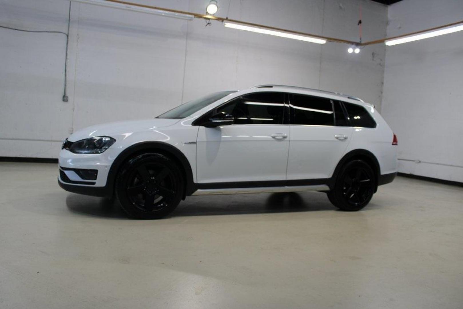 2017 Pure White /Titan Black Volkswagen Golf Alltrack TSI SE (3VWH17AU0HM) with an 1.8L I4 Turbocharged DOHC 16V SULEV II 170hp engine, Automatic transmission, located at 15300 Midway Rd., Addison, TX, 75001, (972) 702-0011, 32.958321, -96.838074 - HOME OF THE NO HAGGLE PRICE - WHOLESALE PRICES TO THE PUBLIC!! 4D Wagon, 1.8L I4 Turbocharged DOHC 16V SULEV II 170hp, 6-Speed DSG Automatic with Tiptronic, AWD, White.<br><br>White 2017 Volkswagen Golf Alltrack<br><br>Recent Arrival! 22/30 City/Highway MPG<br><br><br>At Midway Auto Group, we strive - Photo#4