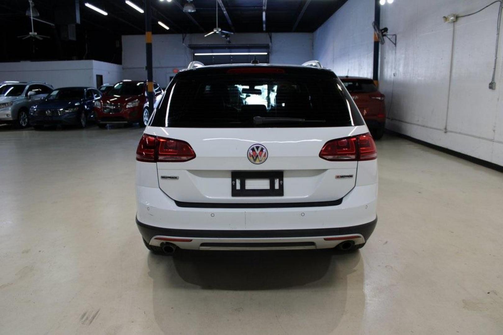 2017 Pure White /Titan Black Volkswagen Golf Alltrack TSI SE (3VWH17AU0HM) with an 1.8L I4 Turbocharged DOHC 16V SULEV II 170hp engine, Automatic transmission, located at 15300 Midway Rd., Addison, TX, 75001, (972) 702-0011, 32.958321, -96.838074 - HOME OF THE NO HAGGLE PRICE - WHOLESALE PRICES TO THE PUBLIC!! 4D Wagon, 1.8L I4 Turbocharged DOHC 16V SULEV II 170hp, 6-Speed DSG Automatic with Tiptronic, AWD, White.<br><br>White 2017 Volkswagen Golf Alltrack<br><br>Recent Arrival! 22/30 City/Highway MPG<br><br><br>At Midway Auto Group, we strive - Photo#7