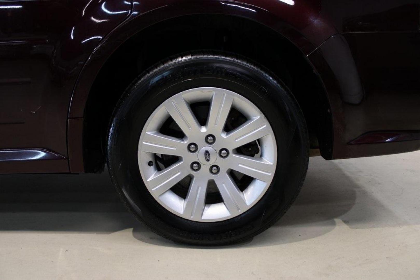 2011 Bordeaux Reserve Red Metallic Ford Flex SE (2FMGK5BC5BB) with an Duratec 3.5L V6 engine, Automatic transmission, located at 15300 Midway Rd., Addison, TX, 75001, (972) 702-0011, 32.958321, -96.838074 - Photo#9