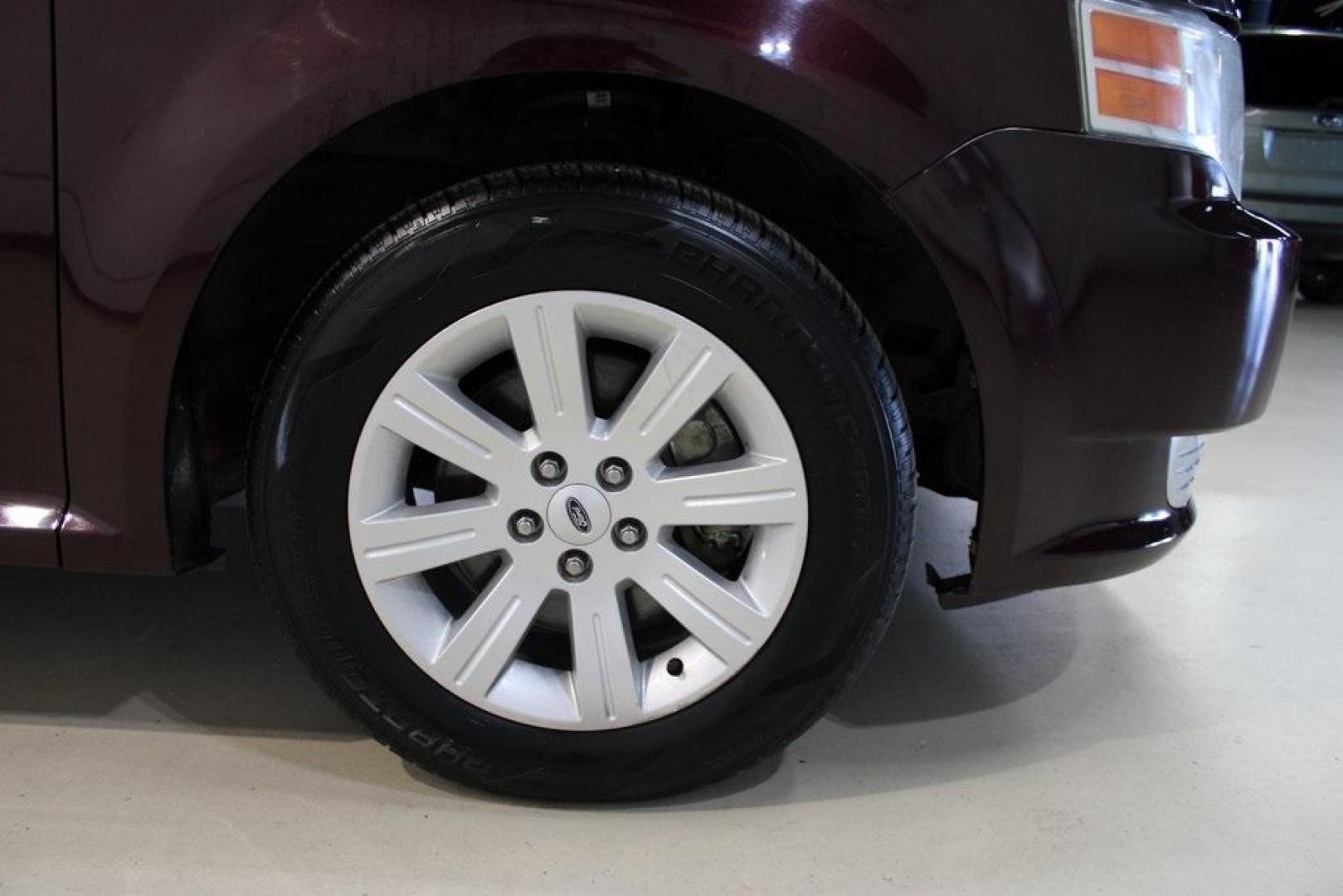 2011 Bordeaux Reserve Red Metallic Ford Flex SE (2FMGK5BC5BB) with an Duratec 3.5L V6 engine, Automatic transmission, located at 15300 Midway Rd., Addison, TX, 75001, (972) 702-0011, 32.958321, -96.838074 - Photo#10