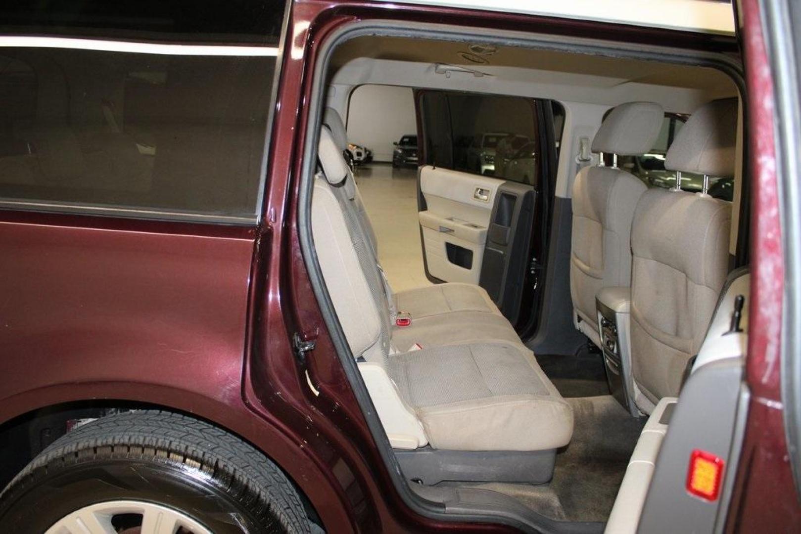 2011 Bordeaux Reserve Red Metallic Ford Flex SE (2FMGK5BC5BB) with an Duratec 3.5L V6 engine, Automatic transmission, located at 15300 Midway Rd., Addison, TX, 75001, (972) 702-0011, 32.958321, -96.838074 - Photo#14