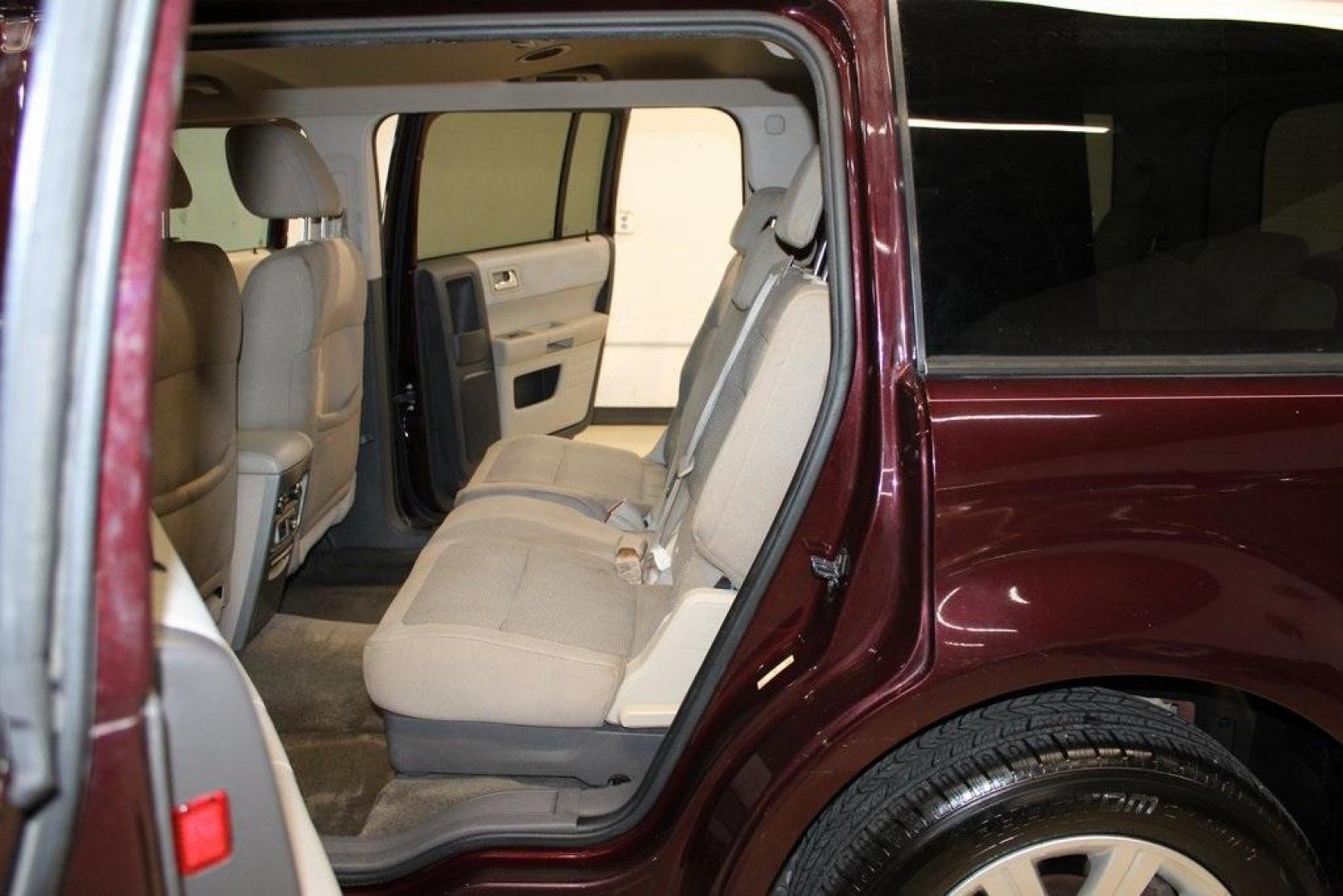 2011 Bordeaux Reserve Red Metallic Ford Flex SE (2FMGK5BC5BB) with an Duratec 3.5L V6 engine, Automatic transmission, located at 15300 Midway Rd., Addison, TX, 75001, (972) 702-0011, 32.958321, -96.838074 - Photo#15