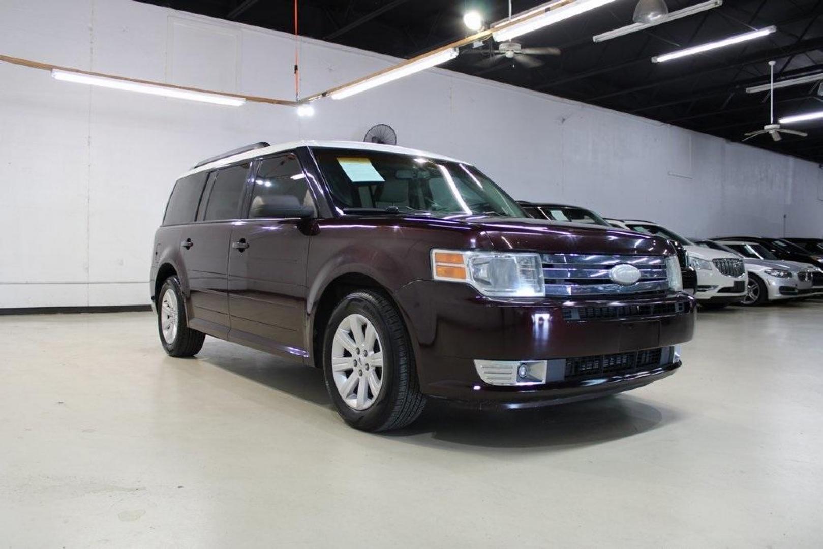 2011 Bordeaux Reserve Red Metallic Ford Flex SE (2FMGK5BC5BB) with an Duratec 3.5L V6 engine, Automatic transmission, located at 15300 Midway Rd., Addison, TX, 75001, (972) 702-0011, 32.958321, -96.838074 - Photo#1