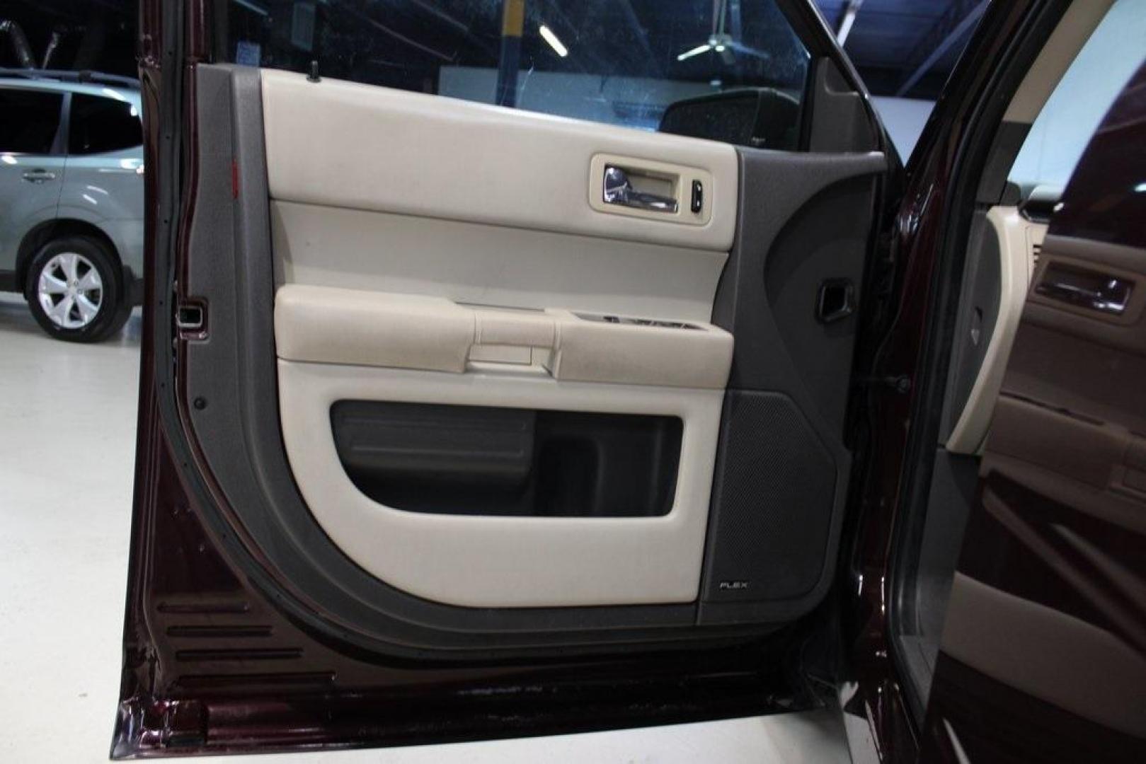 2011 Bordeaux Reserve Red Metallic Ford Flex SE (2FMGK5BC5BB) with an Duratec 3.5L V6 engine, Automatic transmission, located at 15300 Midway Rd., Addison, TX, 75001, (972) 702-0011, 32.958321, -96.838074 - Photo#23