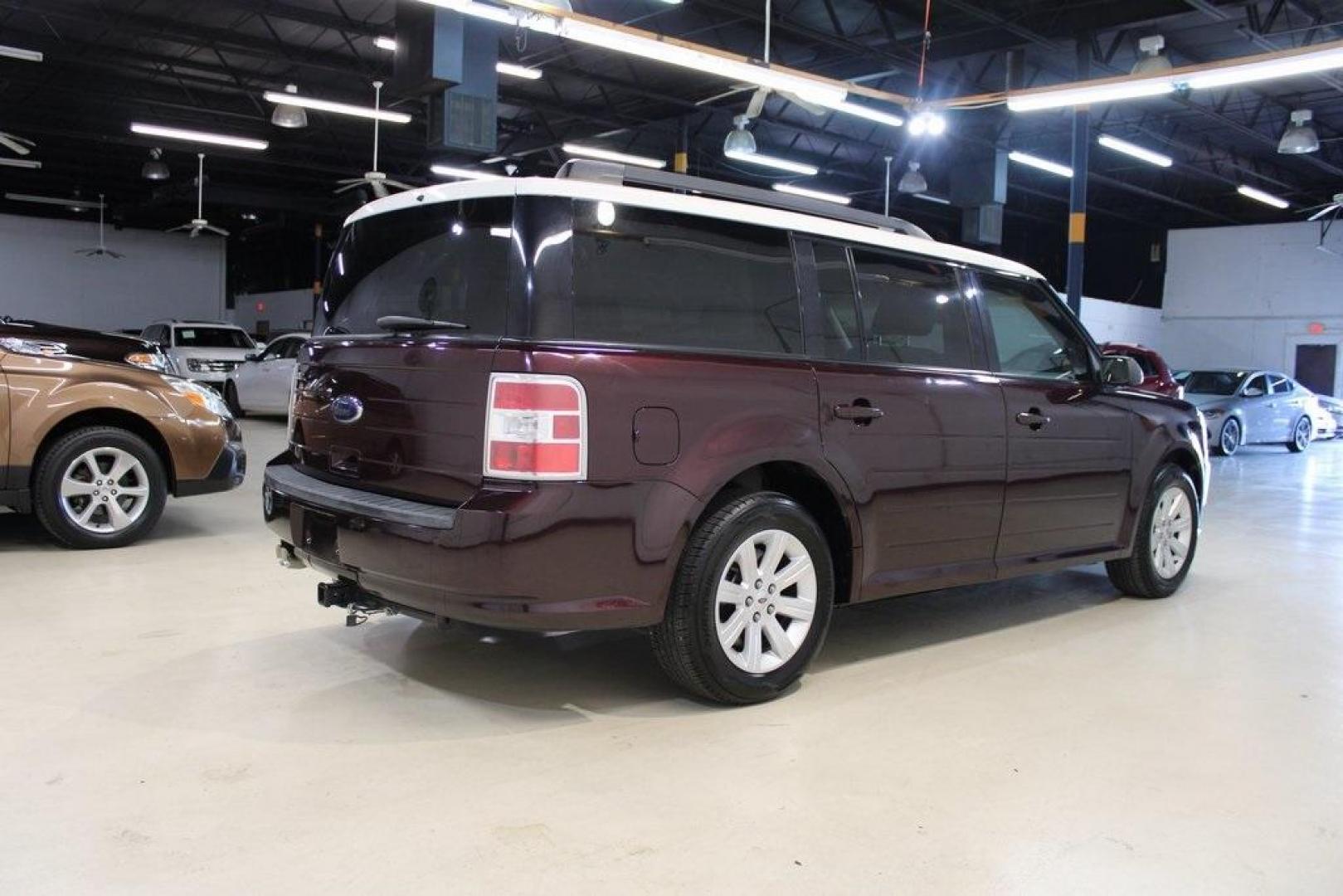 2011 Bordeaux Reserve Red Metallic Ford Flex SE (2FMGK5BC5BB) with an Duratec 3.5L V6 engine, Automatic transmission, located at 15300 Midway Rd., Addison, TX, 75001, (972) 702-0011, 32.958321, -96.838074 - Photo#2