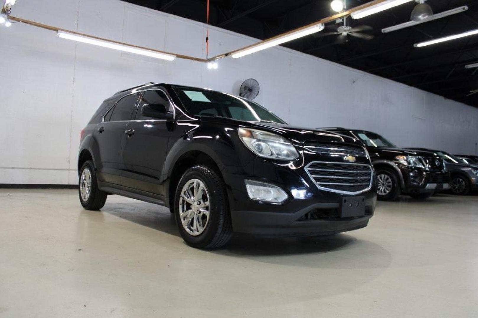 2017 Mosaic Black Metallic /Jet Black Chevrolet Equinox LT (2GNALCEK6H6) with an 2.4L 4-Cylinder SIDI DOHC VVT engine, Automatic transmission, located at 15300 Midway Rd., Addison, TX, 75001, (972) 702-0011, 32.958321, -96.838074 - Introducing the 2017 Chevrolet Equinox LT, now available at Midway Auto Group in Addison, Texas. This versatile SUV combines comfort, efficiency, and modern features, making it an excellent choice for both daily commutes and weekend adventures.<br><br>Key Features:<br><br>Engine: 2.4L 4-Cylinder SID - Photo#1