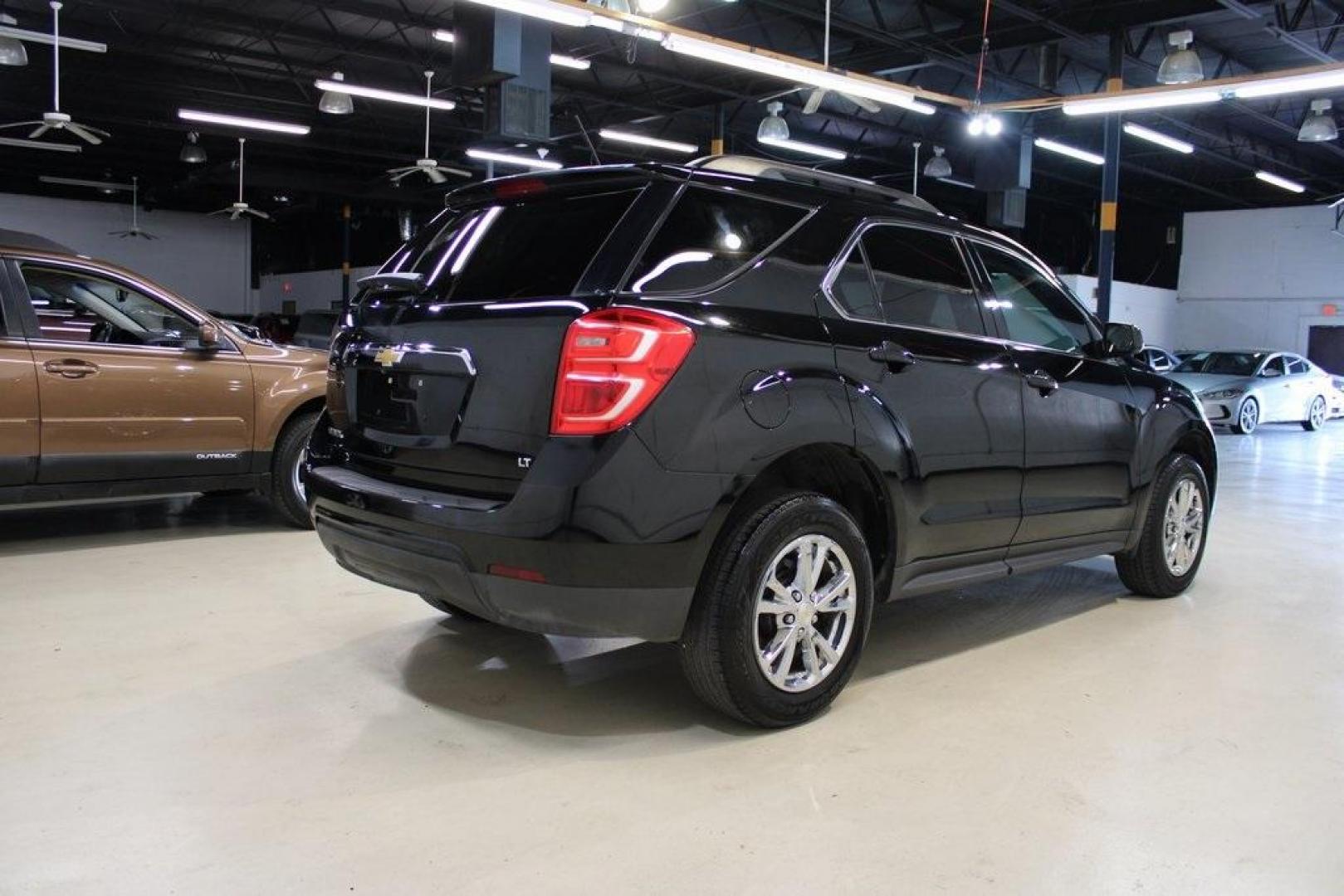 2017 Mosaic Black Metallic /Jet Black Chevrolet Equinox LT (2GNALCEK6H6) with an 2.4L 4-Cylinder SIDI DOHC VVT engine, Automatic transmission, located at 15300 Midway Rd., Addison, TX, 75001, (972) 702-0011, 32.958321, -96.838074 - Introducing the 2017 Chevrolet Equinox LT, now available at Midway Auto Group in Addison, Texas. This versatile SUV combines comfort, efficiency, and modern features, making it an excellent choice for both daily commutes and weekend adventures.<br><br>Key Features:<br><br>Engine: 2.4L 4-Cylinder SID - Photo#2