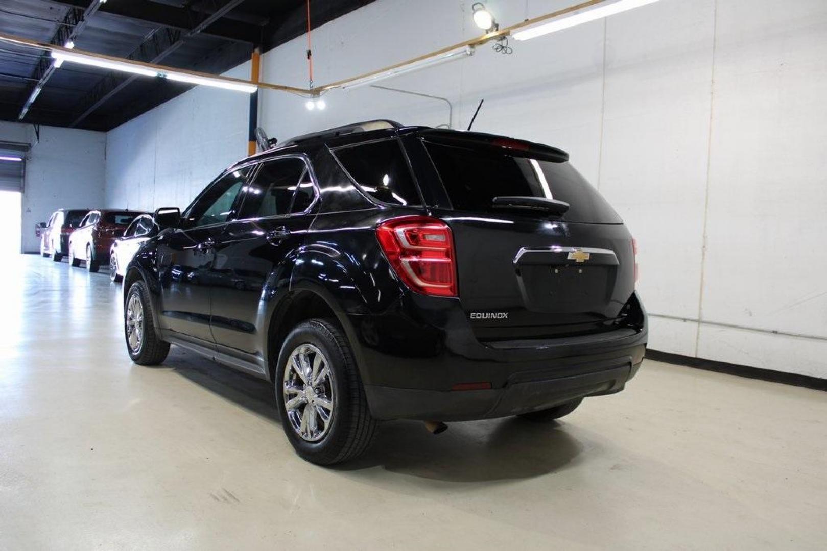 2017 Mosaic Black Metallic /Jet Black Chevrolet Equinox LT (2GNALCEK6H6) with an 2.4L 4-Cylinder SIDI DOHC VVT engine, Automatic transmission, located at 15300 Midway Rd., Addison, TX, 75001, (972) 702-0011, 32.958321, -96.838074 - Introducing the 2017 Chevrolet Equinox LT, now available at Midway Auto Group in Addison, Texas. This versatile SUV combines comfort, efficiency, and modern features, making it an excellent choice for both daily commutes and weekend adventures.<br><br>Key Features:<br><br>Engine: 2.4L 4-Cylinder SID - Photo#3