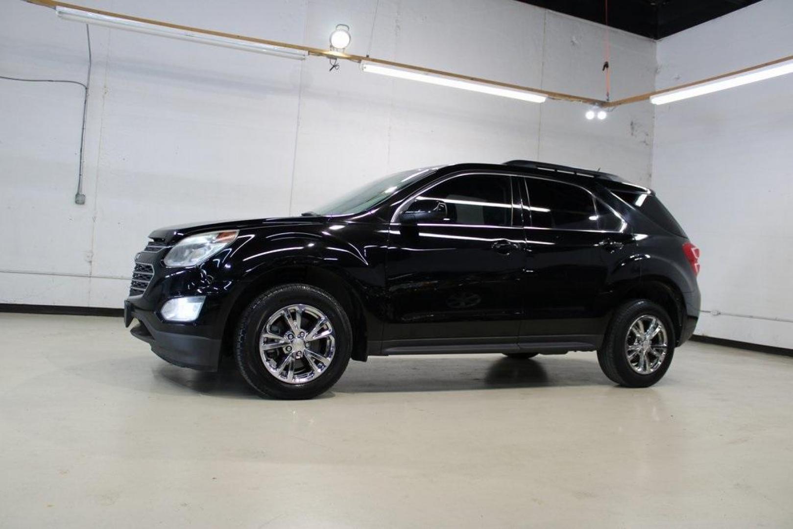 2017 Mosaic Black Metallic /Jet Black Chevrolet Equinox LT (2GNALCEK6H6) with an 2.4L 4-Cylinder SIDI DOHC VVT engine, Automatic transmission, located at 15300 Midway Rd., Addison, TX, 75001, (972) 702-0011, 32.958321, -96.838074 - Introducing the 2017 Chevrolet Equinox LT, now available at Midway Auto Group in Addison, Texas. This versatile SUV combines comfort, efficiency, and modern features, making it an excellent choice for both daily commutes and weekend adventures.<br><br>Key Features:<br><br>Engine: 2.4L 4-Cylinder SID - Photo#4