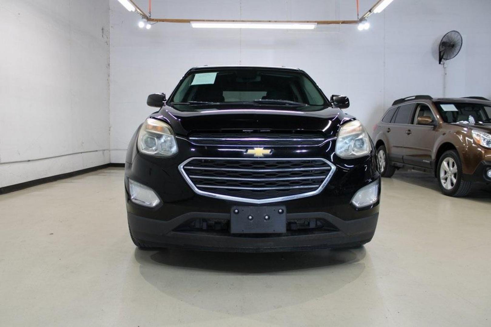 2017 Mosaic Black Metallic /Jet Black Chevrolet Equinox LT (2GNALCEK6H6) with an 2.4L 4-Cylinder SIDI DOHC VVT engine, Automatic transmission, located at 15300 Midway Rd., Addison, TX, 75001, (972) 702-0011, 32.958321, -96.838074 - Introducing the 2017 Chevrolet Equinox LT, now available at Midway Auto Group in Addison, Texas. This versatile SUV combines comfort, efficiency, and modern features, making it an excellent choice for both daily commutes and weekend adventures.<br><br>Key Features:<br><br>Engine: 2.4L 4-Cylinder SID - Photo#5