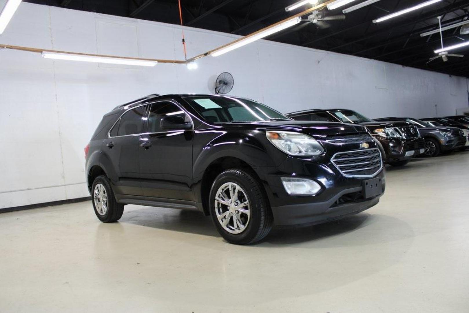 2017 Mosaic Black Metallic /Jet Black Chevrolet Equinox LT (2GNALCEK6H6) with an 2.4L 4-Cylinder SIDI DOHC VVT engine, Automatic transmission, located at 15300 Midway Rd., Addison, TX, 75001, (972) 702-0011, 32.958321, -96.838074 - Introducing the 2017 Chevrolet Equinox LT, now available at Midway Auto Group in Addison, Texas. This versatile SUV combines comfort, efficiency, and modern features, making it an excellent choice for both daily commutes and weekend adventures.<br><br>Key Features:<br><br>Engine: 2.4L 4-Cylinder SID - Photo#6