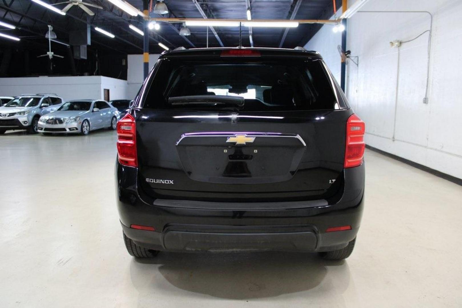 2017 Mosaic Black Metallic /Jet Black Chevrolet Equinox LT (2GNALCEK6H6) with an 2.4L 4-Cylinder SIDI DOHC VVT engine, Automatic transmission, located at 15300 Midway Rd., Addison, TX, 75001, (972) 702-0011, 32.958321, -96.838074 - Introducing the 2017 Chevrolet Equinox LT, now available at Midway Auto Group in Addison, Texas. This versatile SUV combines comfort, efficiency, and modern features, making it an excellent choice for both daily commutes and weekend adventures.<br><br>Key Features:<br><br>Engine: 2.4L 4-Cylinder SID - Photo#7