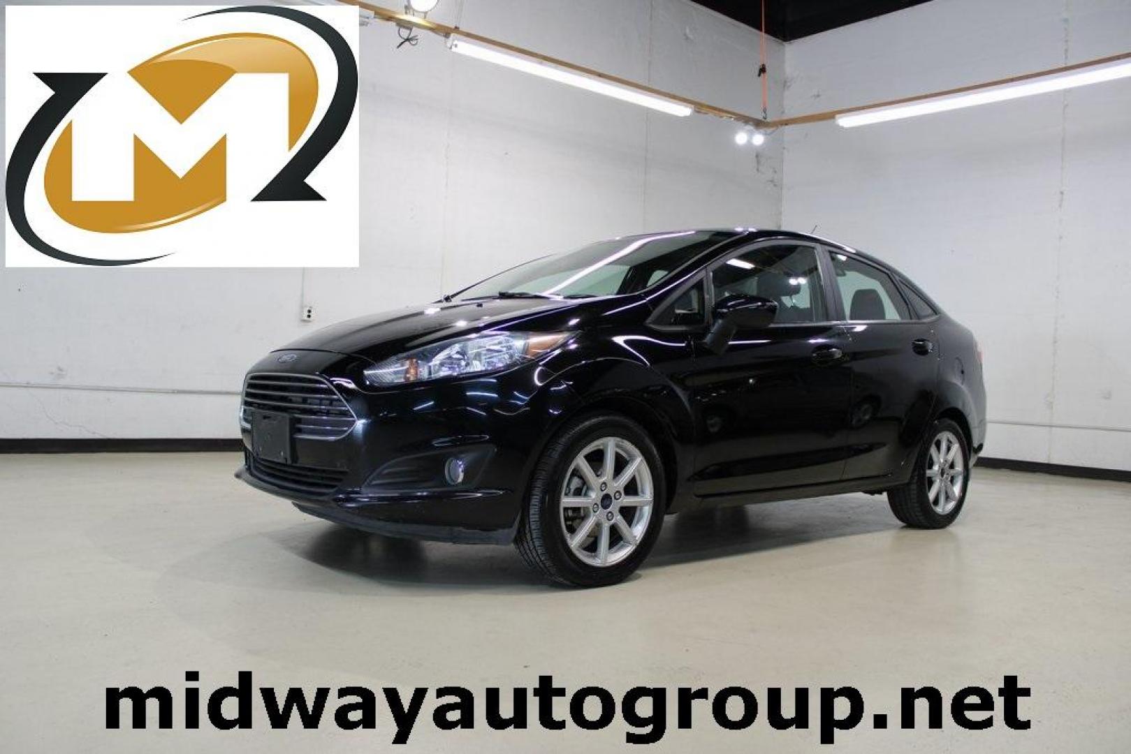 2019 Shadow Black /Charcoal Black Ford Fiesta SE (3FADP4BJ9KM) with an 1.6L I4 Ti-VCT engine, Automatic transmission, located at 15300 Midway Rd., Addison, TX, 75001, (972) 702-0011, 32.958321, -96.838074 - Introducing the 2019 Ford Fiesta SE, now available at Midway Auto Group in Addison, Texas. This compact sedan offers a harmonious blend of efficiency, comfort, and modern features, making it an excellent choice for daily commutes and city driving.<br><br>Key Features:<br><br>Engine: 1.6L I4 Ti-VCT<b - Photo#0