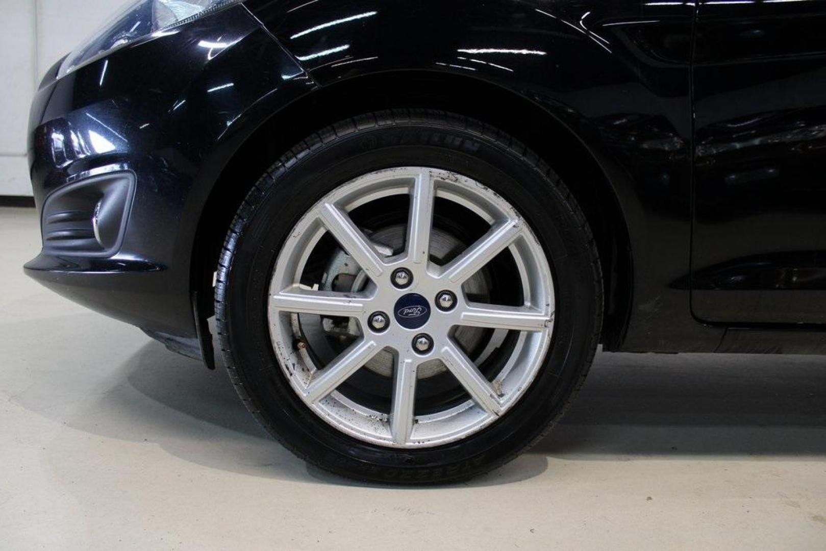 2019 Shadow Black /Charcoal Black Ford Fiesta SE (3FADP4BJ9KM) with an 1.6L I4 Ti-VCT engine, Automatic transmission, located at 15300 Midway Rd., Addison, TX, 75001, (972) 702-0011, 32.958321, -96.838074 - Introducing the 2019 Ford Fiesta SE, now available at Midway Auto Group in Addison, Texas. This compact sedan offers a harmonious blend of efficiency, comfort, and modern features, making it an excellent choice for daily commutes and city driving.<br><br>Key Features:<br><br>Engine: 1.6L I4 Ti-VCT<b - Photo#9
