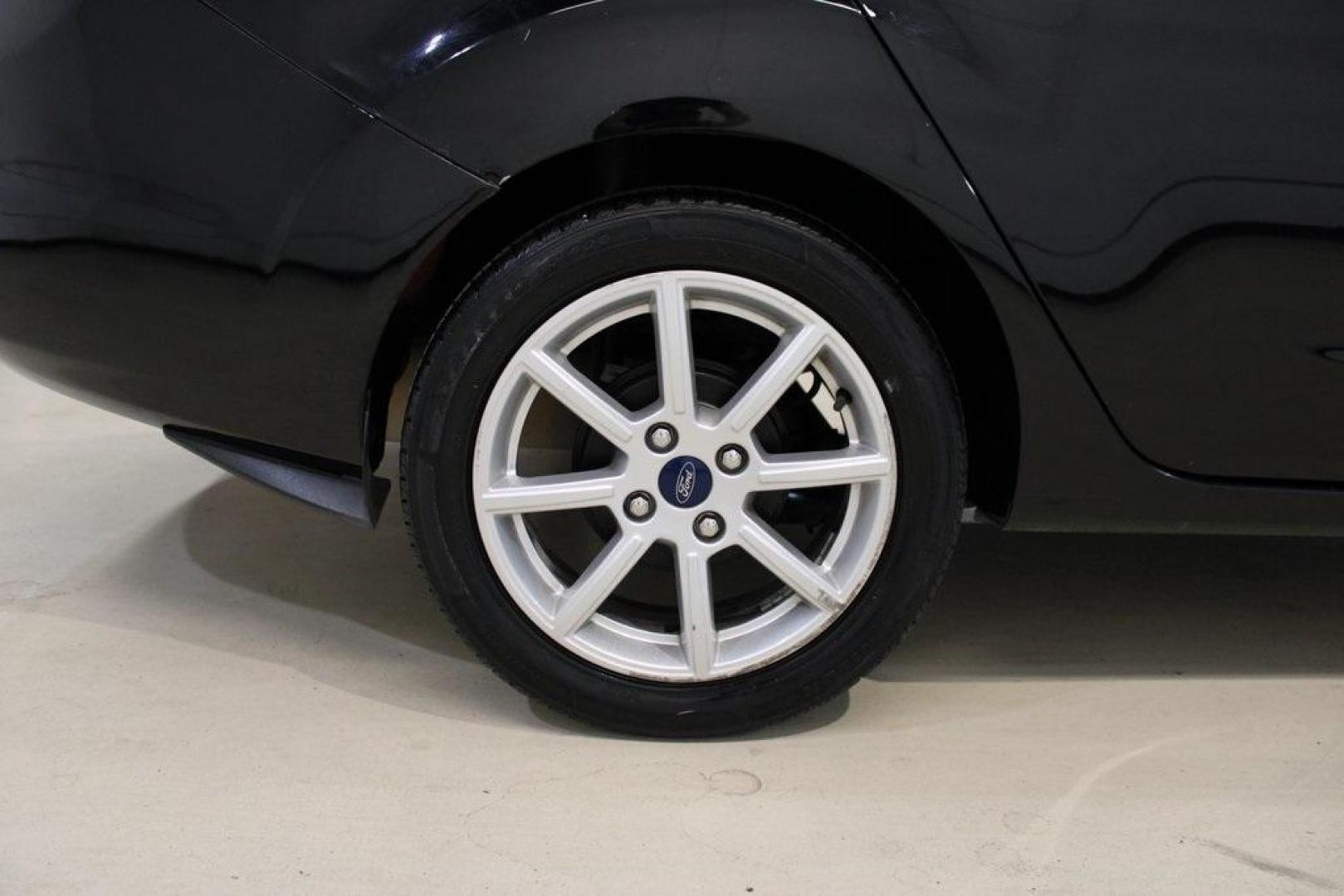 2019 Shadow Black /Charcoal Black Ford Fiesta SE (3FADP4BJ9KM) with an 1.6L I4 Ti-VCT engine, Automatic transmission, located at 15300 Midway Rd., Addison, TX, 75001, (972) 702-0011, 32.958321, -96.838074 - Introducing the 2019 Ford Fiesta SE, now available at Midway Auto Group in Addison, Texas. This compact sedan offers a harmonious blend of efficiency, comfort, and modern features, making it an excellent choice for daily commutes and city driving.<br><br>Key Features:<br><br>Engine: 1.6L I4 Ti-VCT<b - Photo#11