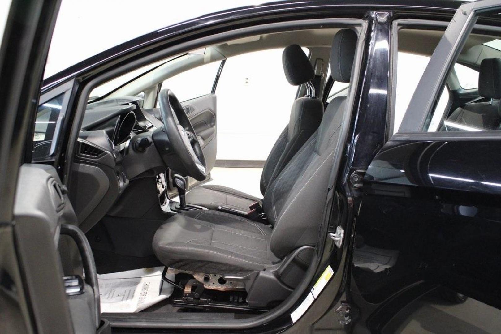 2019 Shadow Black /Charcoal Black Ford Fiesta SE (3FADP4BJ9KM) with an 1.6L I4 Ti-VCT engine, Automatic transmission, located at 15300 Midway Rd., Addison, TX, 75001, (972) 702-0011, 32.958321, -96.838074 - Introducing the 2019 Ford Fiesta SE, now available at Midway Auto Group in Addison, Texas. This compact sedan offers a harmonious blend of efficiency, comfort, and modern features, making it an excellent choice for daily commutes and city driving.<br><br>Key Features:<br><br>Engine: 1.6L I4 Ti-VCT<b - Photo#14