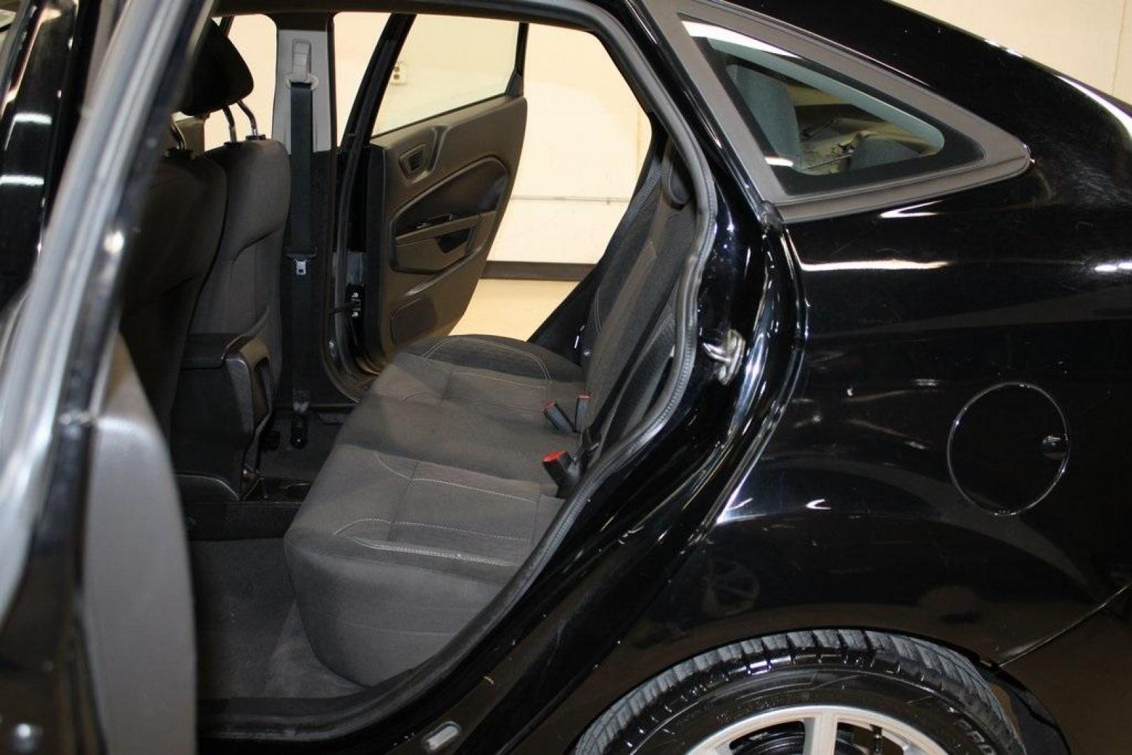 2019 Shadow Black /Charcoal Black Ford Fiesta SE (3FADP4BJ9KM) with an 1.6L I4 Ti-VCT engine, Automatic transmission, located at 15300 Midway Rd., Addison, TX, 75001, (972) 702-0011, 32.958321, -96.838074 - Introducing the 2019 Ford Fiesta SE, now available at Midway Auto Group in Addison, Texas. This compact sedan offers a harmonious blend of efficiency, comfort, and modern features, making it an excellent choice for daily commutes and city driving.<br><br>Key Features:<br><br>Engine: 1.6L I4 Ti-VCT<b - Photo#17