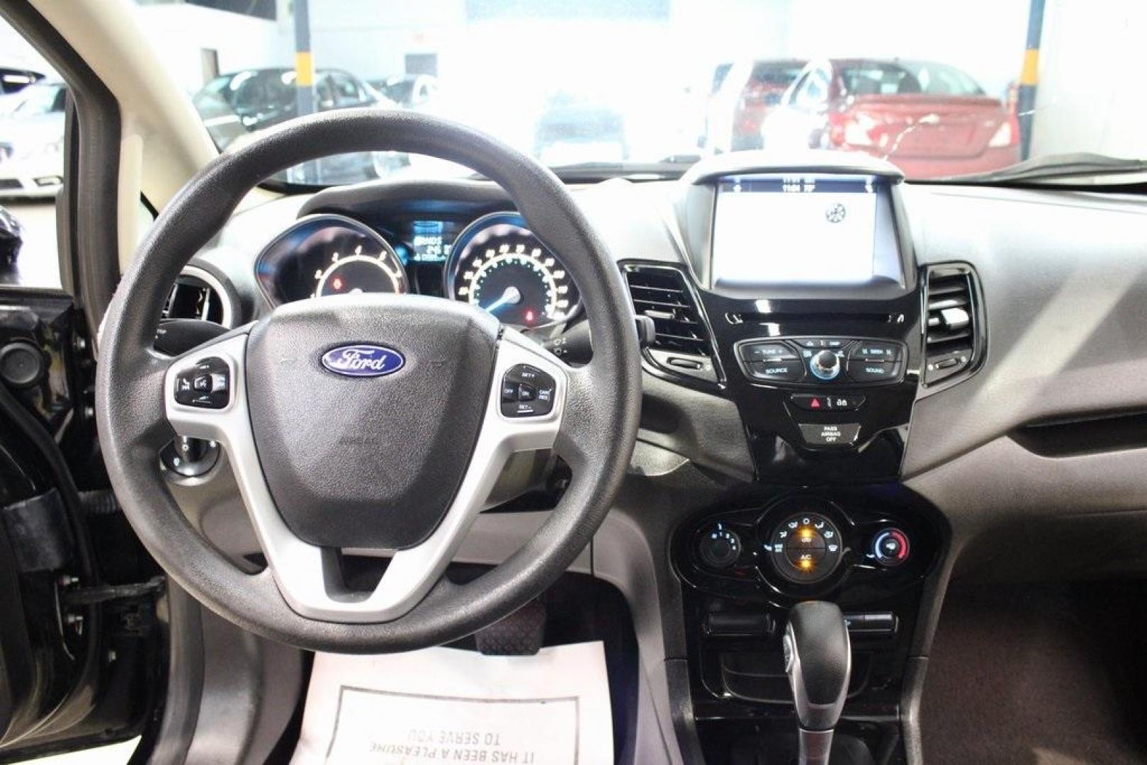 2019 Shadow Black /Charcoal Black Ford Fiesta SE (3FADP4BJ9KM) with an 1.6L I4 Ti-VCT engine, Automatic transmission, located at 15300 Midway Rd., Addison, TX, 75001, (972) 702-0011, 32.958321, -96.838074 - Introducing the 2019 Ford Fiesta SE, now available at Midway Auto Group in Addison, Texas. This compact sedan offers a harmonious blend of efficiency, comfort, and modern features, making it an excellent choice for daily commutes and city driving.<br><br>Key Features:<br><br>Engine: 1.6L I4 Ti-VCT<b - Photo#18