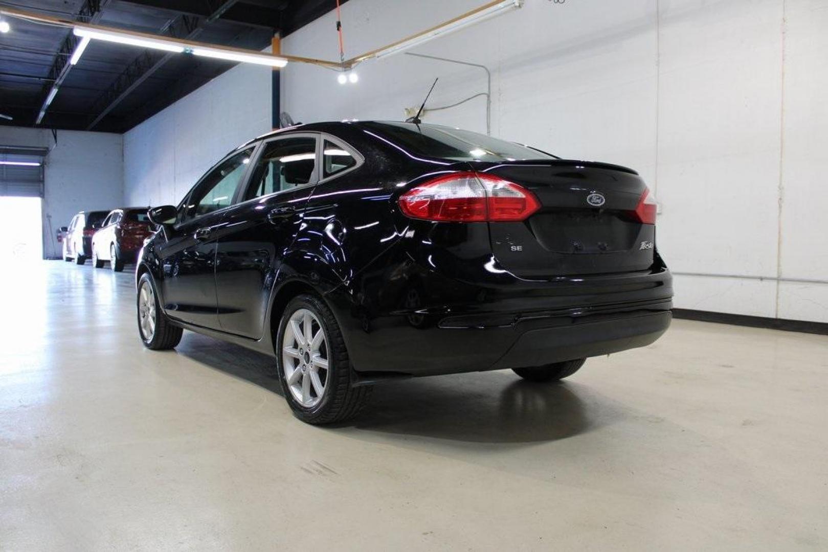 2019 Shadow Black /Charcoal Black Ford Fiesta SE (3FADP4BJ9KM) with an 1.6L I4 Ti-VCT engine, Automatic transmission, located at 15300 Midway Rd., Addison, TX, 75001, (972) 702-0011, 32.958321, -96.838074 - Introducing the 2019 Ford Fiesta SE, now available at Midway Auto Group in Addison, Texas. This compact sedan offers a harmonious blend of efficiency, comfort, and modern features, making it an excellent choice for daily commutes and city driving.<br><br>Key Features:<br><br>Engine: 1.6L I4 Ti-VCT<b - Photo#3