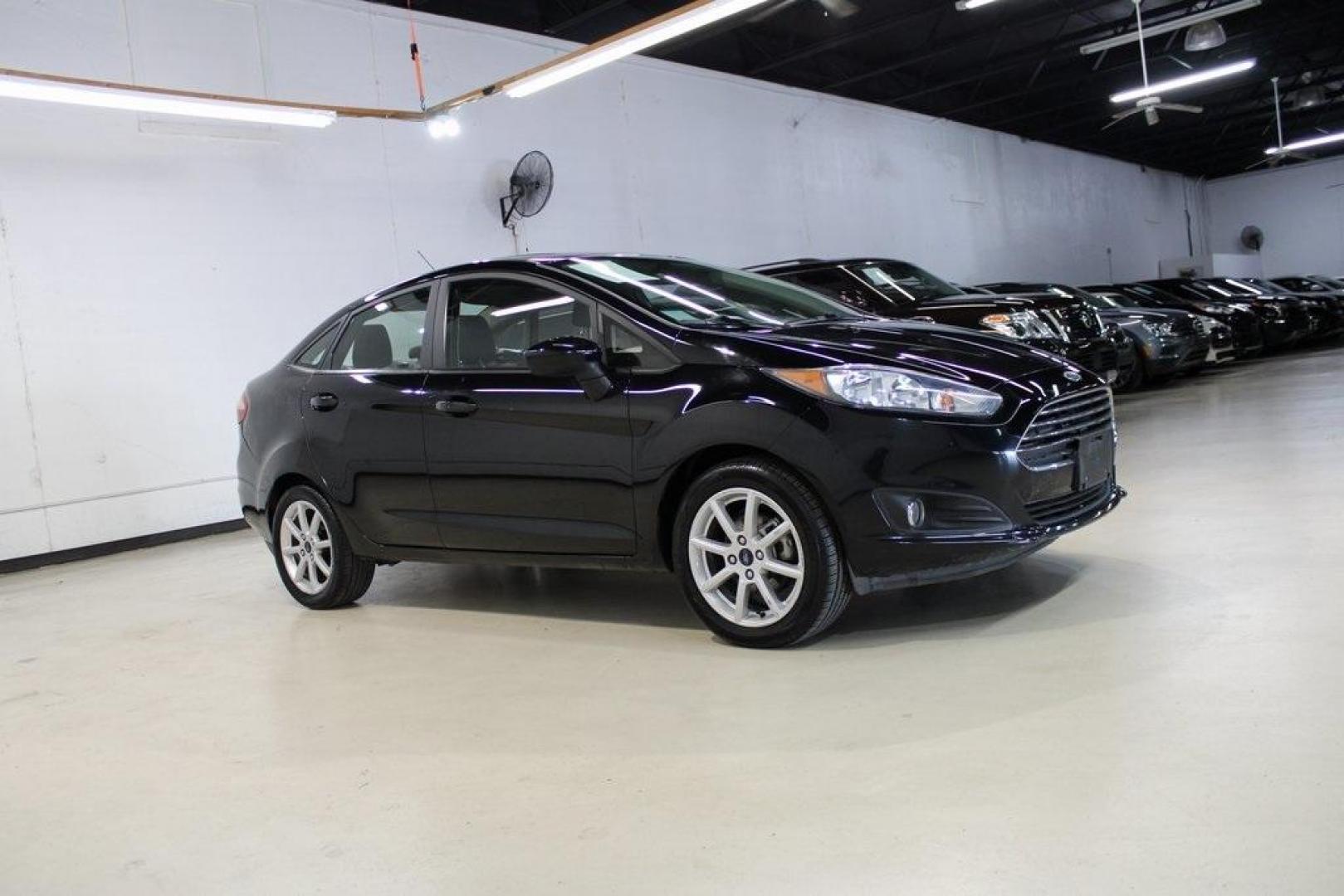 2019 Shadow Black /Charcoal Black Ford Fiesta SE (3FADP4BJ9KM) with an 1.6L I4 Ti-VCT engine, Automatic transmission, located at 15300 Midway Rd., Addison, TX, 75001, (972) 702-0011, 32.958321, -96.838074 - Introducing the 2019 Ford Fiesta SE, now available at Midway Auto Group in Addison, Texas. This compact sedan offers a harmonious blend of efficiency, comfort, and modern features, making it an excellent choice for daily commutes and city driving.<br><br>Key Features:<br><br>Engine: 1.6L I4 Ti-VCT<b - Photo#6