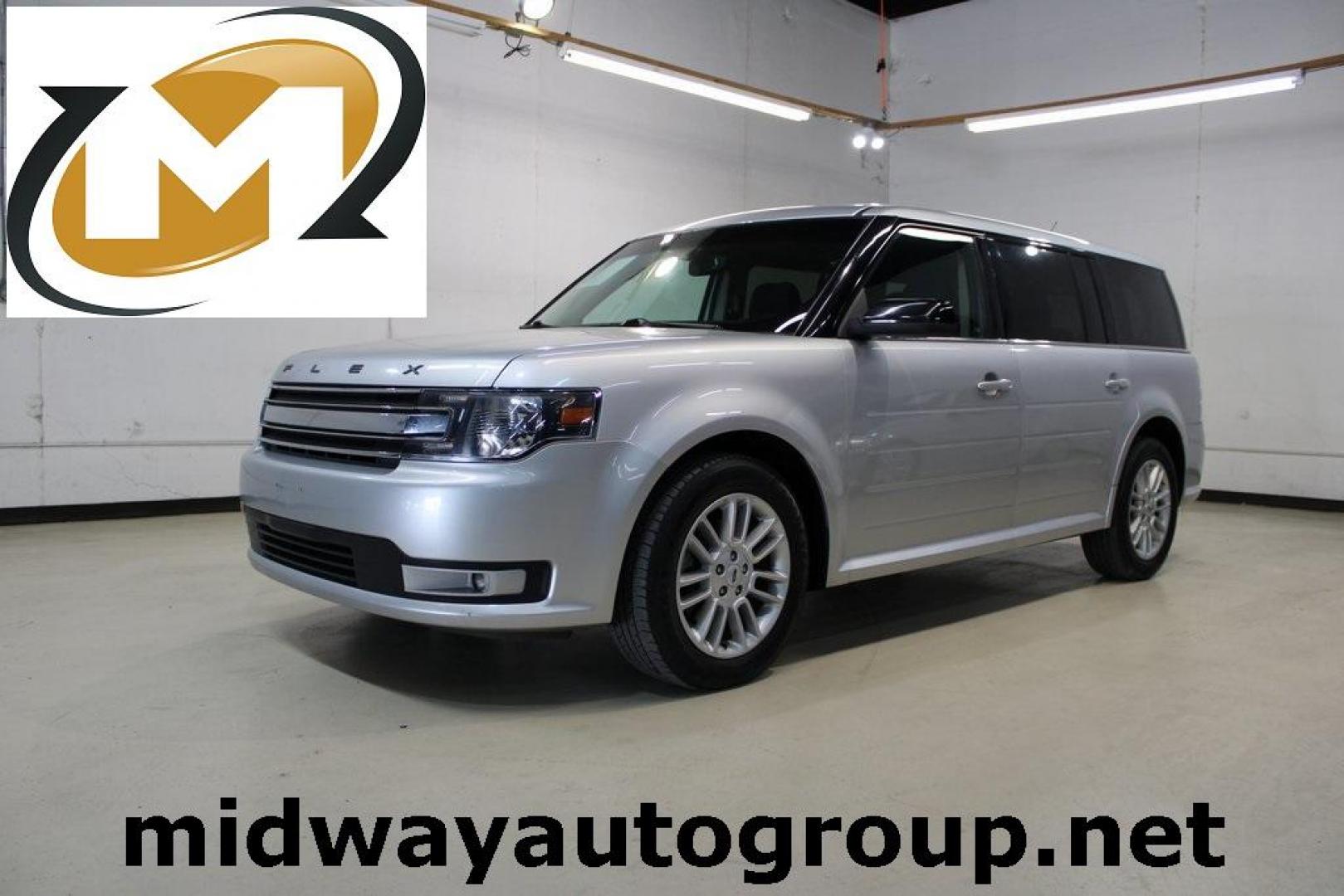 2013 Ingot Silver /Charcoal Black Ford Flex SEL (2FMGK5C83DB) with an 3.5L V6 Ti-VCT engine, Automatic transmission, located at 15300 Midway Rd., Addison, TX, 75001, (972) 702-0011, 32.958321, -96.838074 - HOME OF THE NO HAGGLE PRICE - WHOLESALE PRICES TO THE PUBLIC!! Flex SEL, 4D Sport Utility, 3.5L V6 Ti-VCT, 6-Speed Automatic with Select-Shift, FWD, Silver, Charcoal Black Cloth.<br><br>Silver 2013 Ford Flex SEL<br><br><br>Awards:<br> * 2013 IIHS Top Safety Pick * 2013 KBB.com Brand Image Awards< - Photo#0