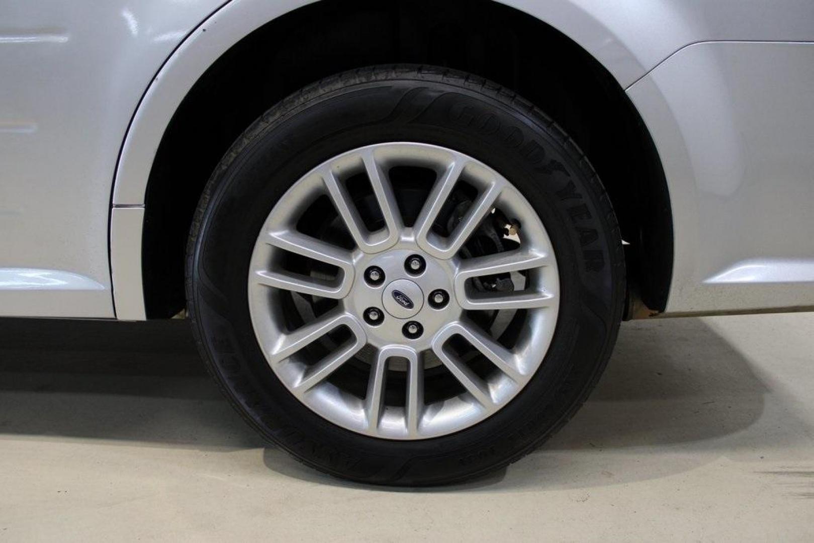 2013 Ingot Silver /Charcoal Black Ford Flex SEL (2FMGK5C83DB) with an 3.5L V6 Ti-VCT engine, Automatic transmission, located at 15300 Midway Rd., Addison, TX, 75001, (972) 702-0011, 32.958321, -96.838074 - HOME OF THE NO HAGGLE PRICE - WHOLESALE PRICES TO THE PUBLIC!! Flex SEL, 4D Sport Utility, 3.5L V6 Ti-VCT, 6-Speed Automatic with Select-Shift, FWD, Silver, Charcoal Black Cloth.<br><br>Silver 2013 Ford Flex SEL<br><br><br>Awards:<br> * 2013 IIHS Top Safety Pick * 2013 KBB.com Brand Image Awards< - Photo#9