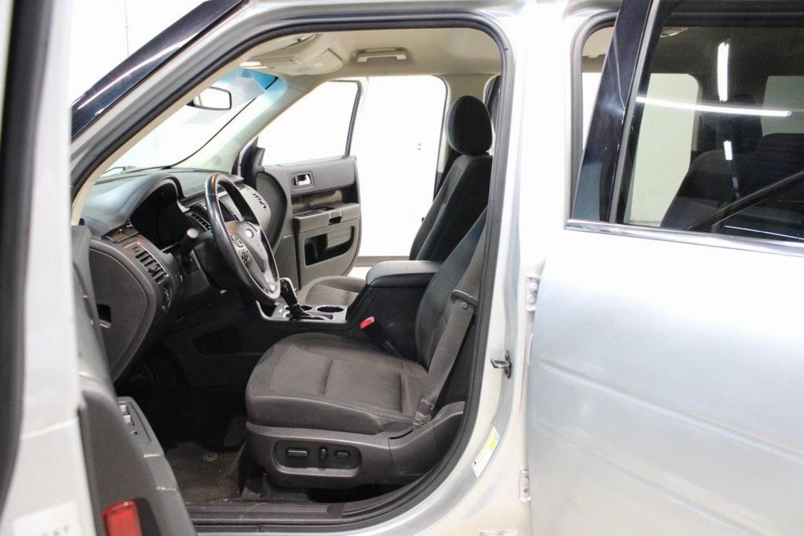 2013 Ingot Silver /Charcoal Black Ford Flex SEL (2FMGK5C83DB) with an 3.5L V6 Ti-VCT engine, Automatic transmission, located at 15300 Midway Rd., Addison, TX, 75001, (972) 702-0011, 32.958321, -96.838074 - HOME OF THE NO HAGGLE PRICE - WHOLESALE PRICES TO THE PUBLIC!! Flex SEL, 4D Sport Utility, 3.5L V6 Ti-VCT, 6-Speed Automatic with Select-Shift, FWD, Silver, Charcoal Black Cloth.<br><br>Silver 2013 Ford Flex SEL<br><br><br>Awards:<br> * 2013 IIHS Top Safety Pick * 2013 KBB.com Brand Image Awards< - Photo#12