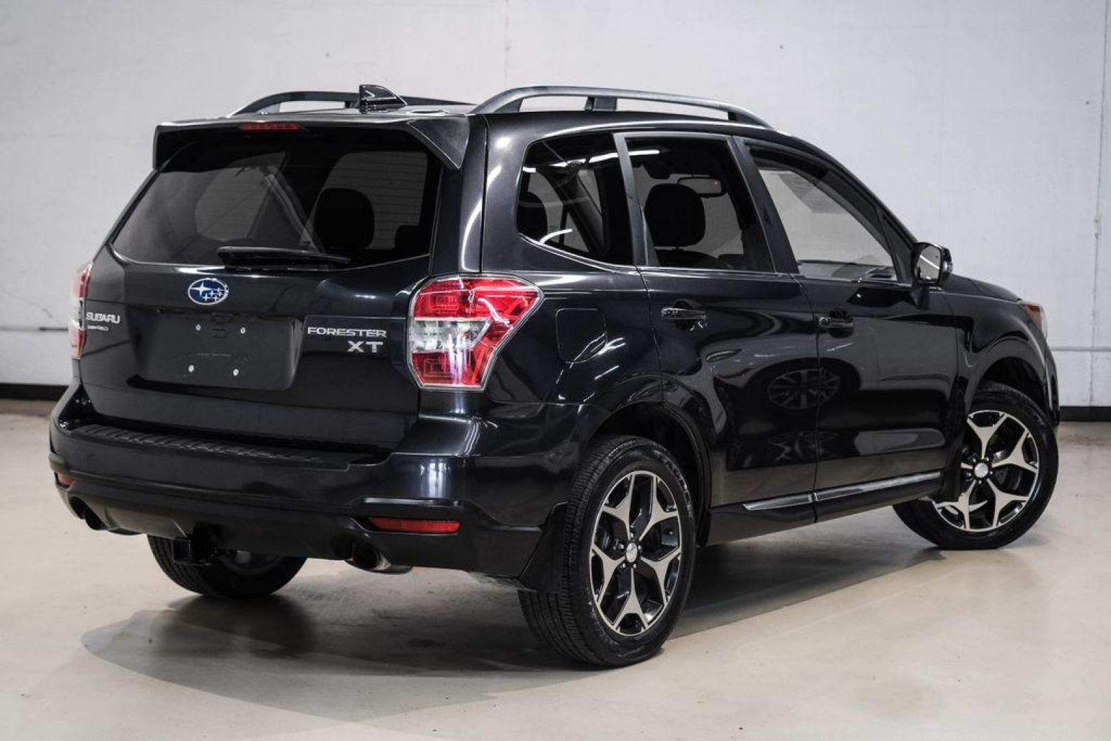 2016 Dark Gray Metallic /Black Subaru Forester 2.0XT Touring (JF2SJGXC6GH) with an 2.0L 4-Cylinder DOHC 16V Turbocharged Intercooled engine, CVT transmission, located at 15300 Midway Rd., Addison, TX, 75001, (972) 702-0011, 32.958321, -96.838074 - Photo#8