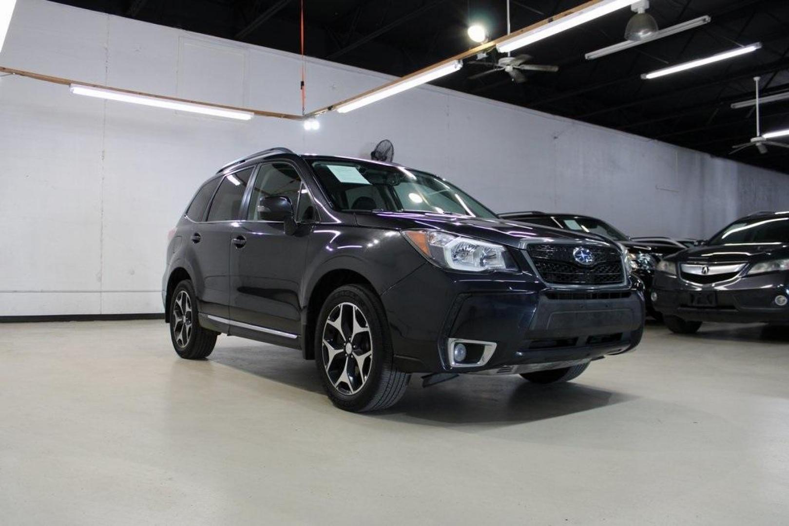 2016 Dark Gray Metallic /Black Subaru Forester 2.0XT Touring (JF2SJGXC6GH) with an 2.0L 4-Cylinder DOHC 16V Turbocharged Intercooled engine, CVT transmission, located at 15300 Midway Rd., Addison, TX, 75001, (972) 702-0011, 32.958321, -96.838074 - Introducing the 2016 Subaru Forester 2.5i Touring, now available at Midway Auto Group in Addison, Texas. This versatile SUV combines Subaru's renowned all-wheel-drive capability with a suite of premium features, making it an excellent choice for both urban commutes and outdoor adventures.<br><br>Key - Photo#1