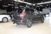 2016 Dark Gray Metallic /Black Subaru Forester 2.0XT Touring (JF2SJGXC6GH) with an 2.0L 4-Cylinder DOHC 16V Turbocharged Intercooled engine, CVT transmission, located at 15300 Midway Rd., Addison, TX, 75001, (972) 702-0011, 32.958321, -96.838074 - Introducing the 2016 Subaru Forester 2.5i Touring, now available at Midway Auto Group in Addison, Texas. This versatile SUV combines Subaru's renowned all-wheel-drive capability with a suite of premium features, making it an excellent choice for both urban commutes and outdoor adventures.<br><br>Key - Photo#2